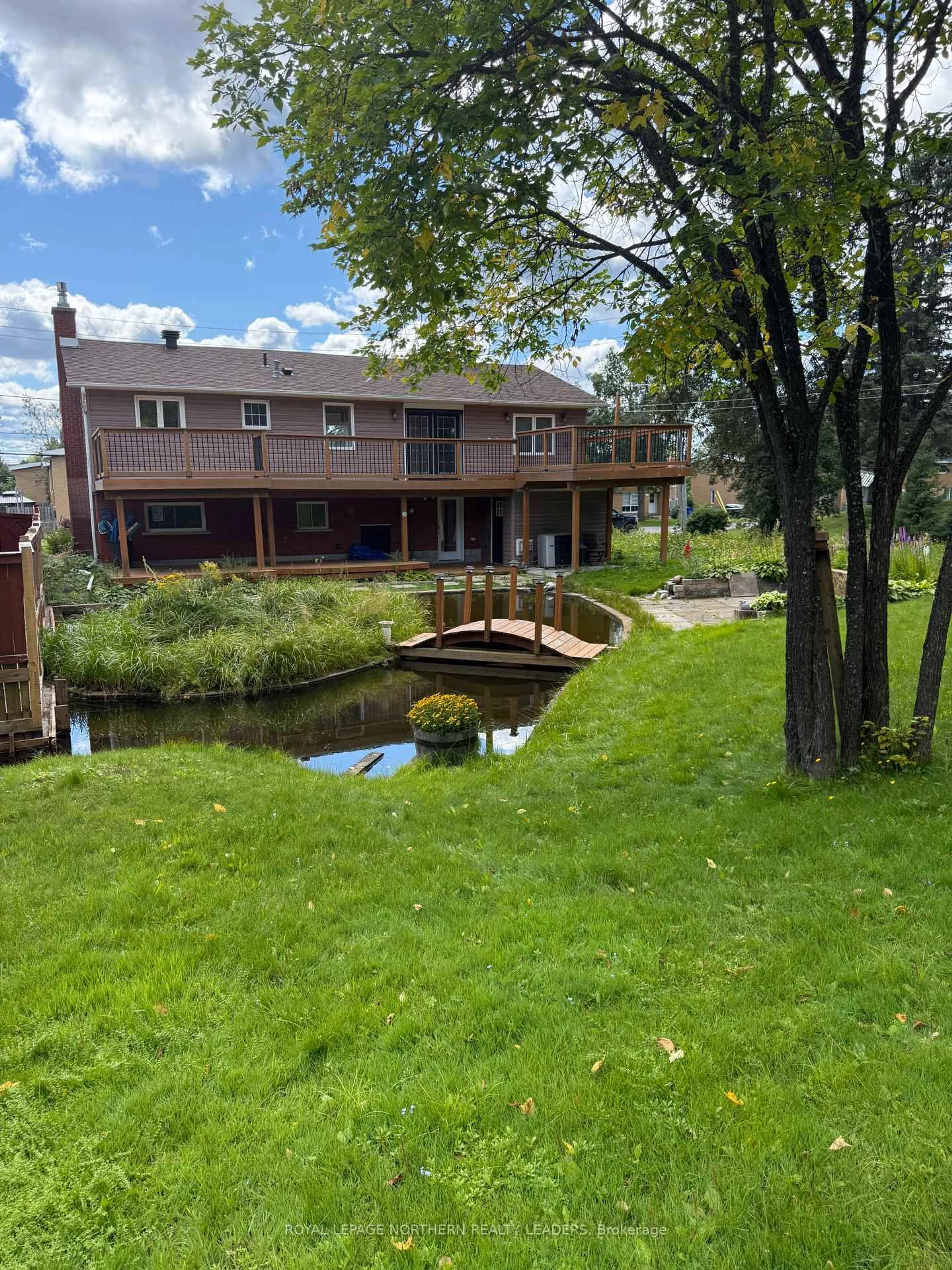 A pic from outside/outdoor area/front of a property/back of a property/a pic from drone, water/lake/river/ocean view for 84 Brousseau Ave, Timmins Ontario P4N 5Y2