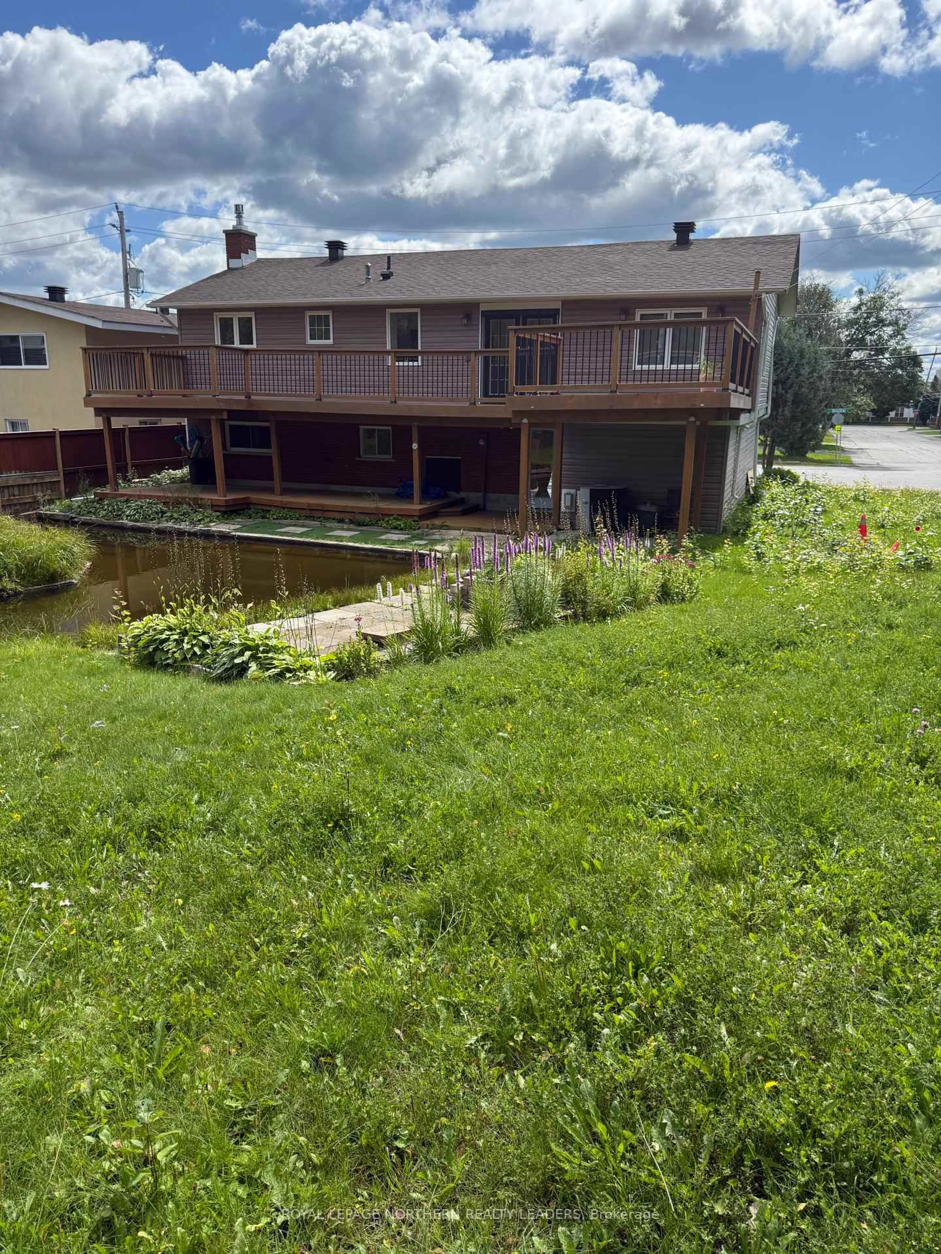 A pic from outside/outdoor area/front of a property/back of a property/a pic from drone, unknown for 84 Brousseau Ave, Timmins Ontario P4N 5Y2