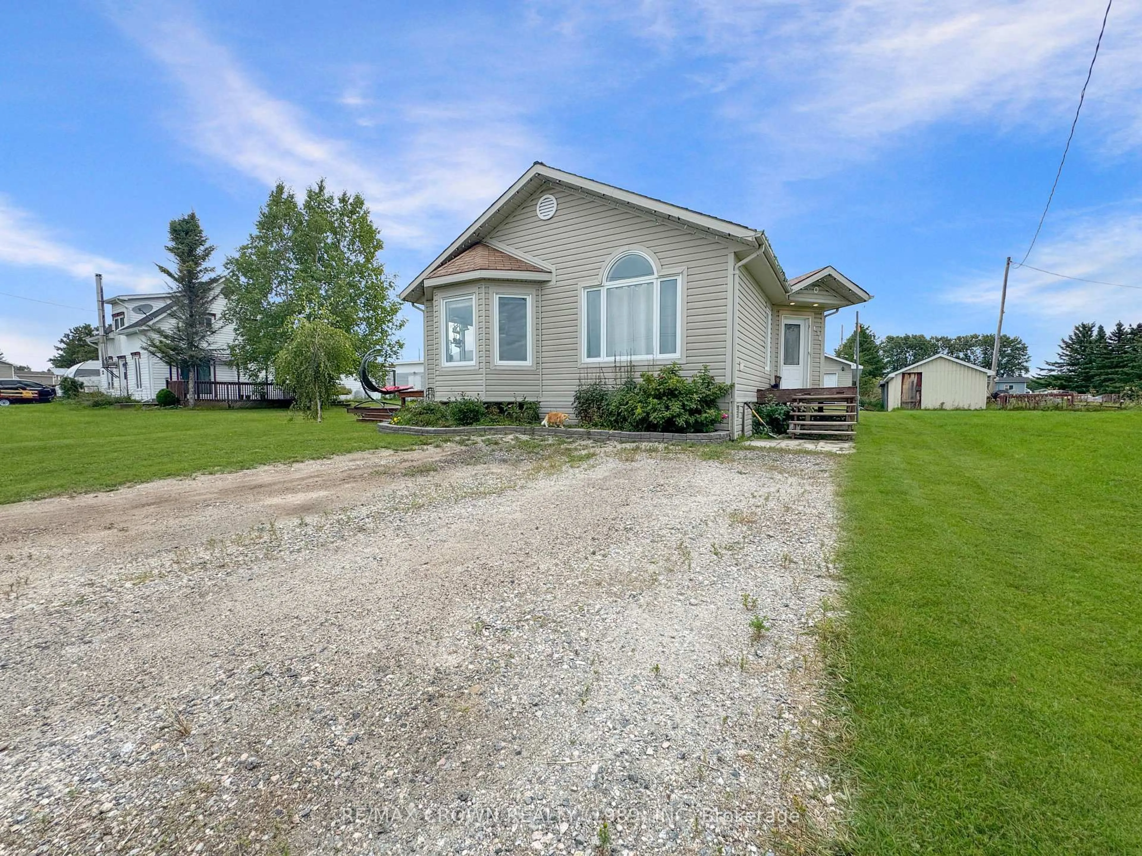 A pic from outside/outdoor area/front of a property/back of a property/a pic from drone, water/lake/river/ocean view for 171 583 Highway, Hearst Ontario P0L 1R0