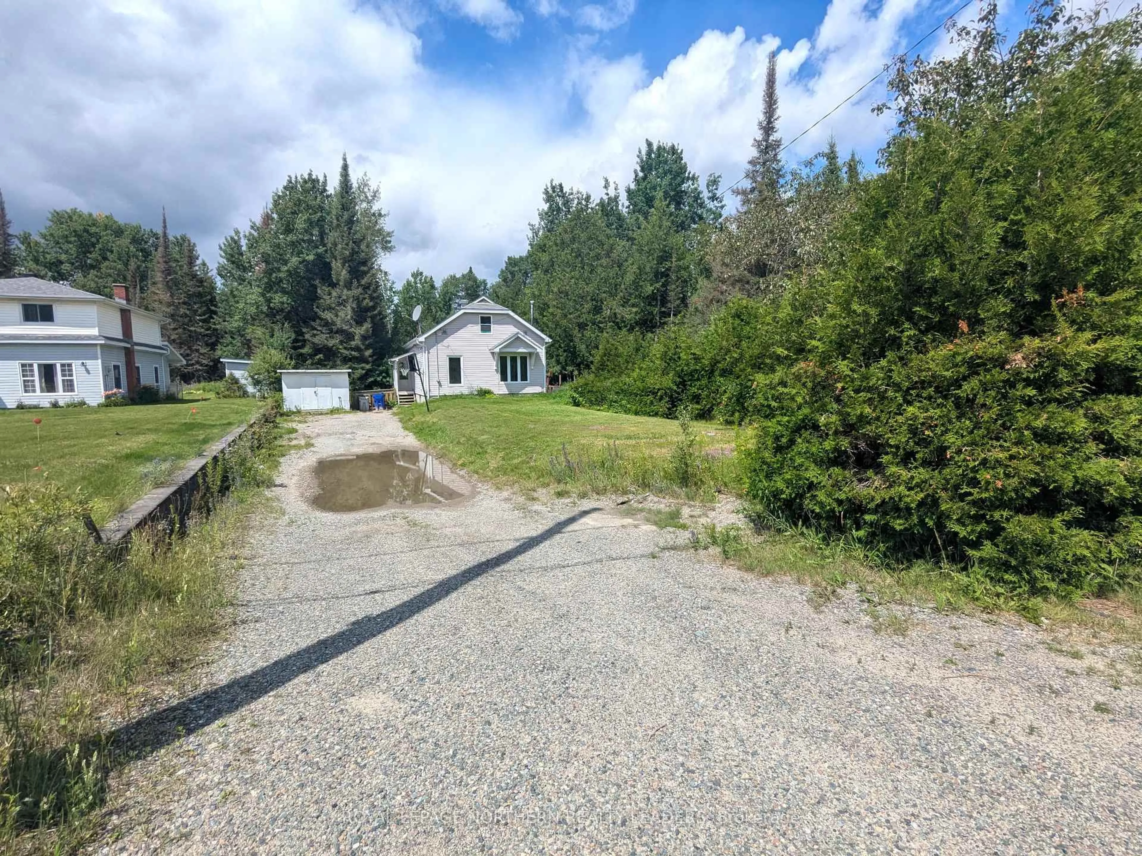 A pic from outside/outdoor area/front of a property/back of a property/a pic from drone, street for 359 Carium Rd, Timmins Ontario P0N 1G0