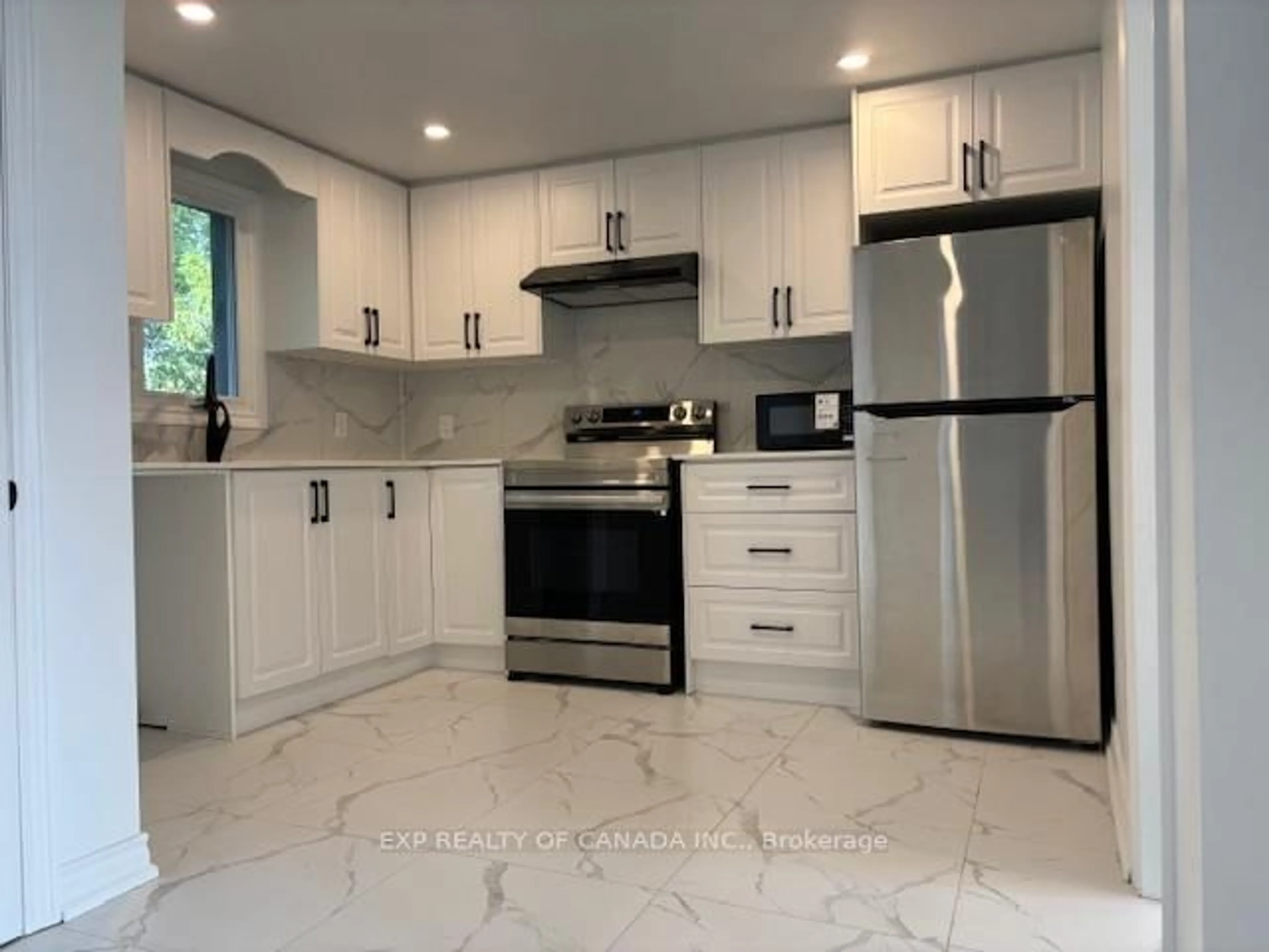 Open concept kitchen, ceramic/tile floor for 34 Floral Ave, Timmins Ontario P4N 4H5