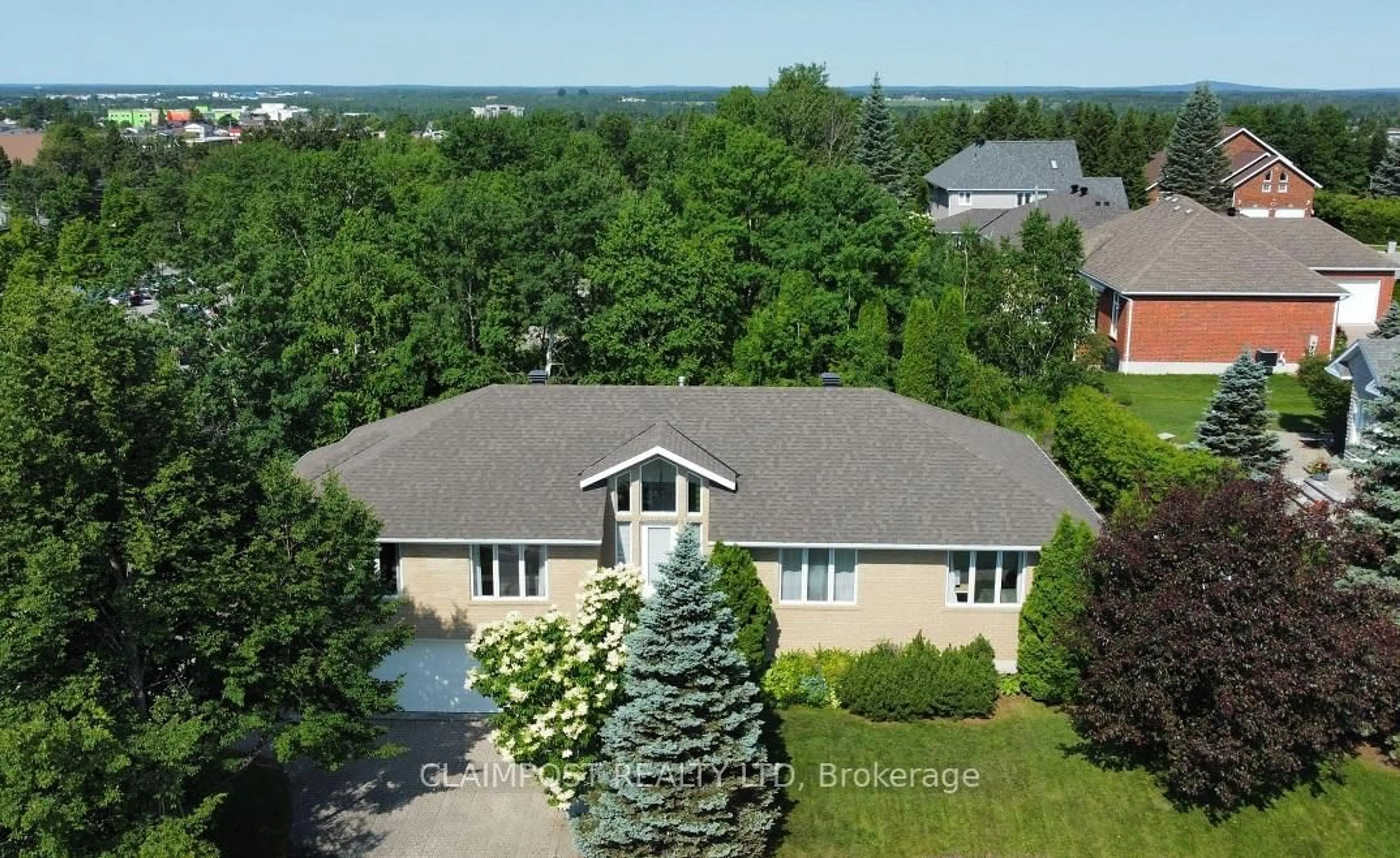 A pic from outside/outdoor area/front of a property/back of a property/a pic from drone, street for 697 Lavigne Blvd, Timmins Ontario P4N 8M7