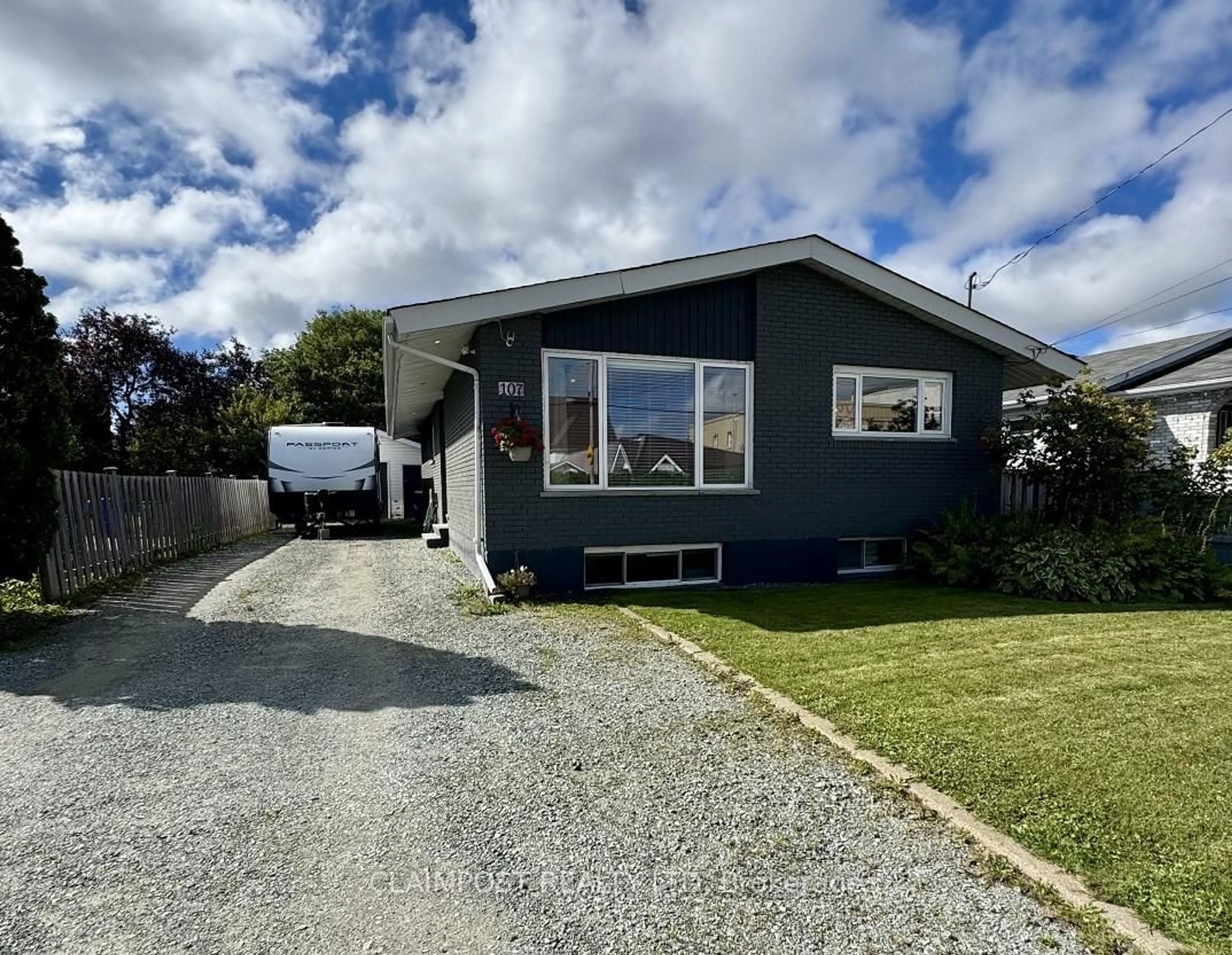 A pic from outside/outdoor area/front of a property/back of a property/a pic from drone, street for 107 Bloor Ave, Timmins Ontario P0N 1H0