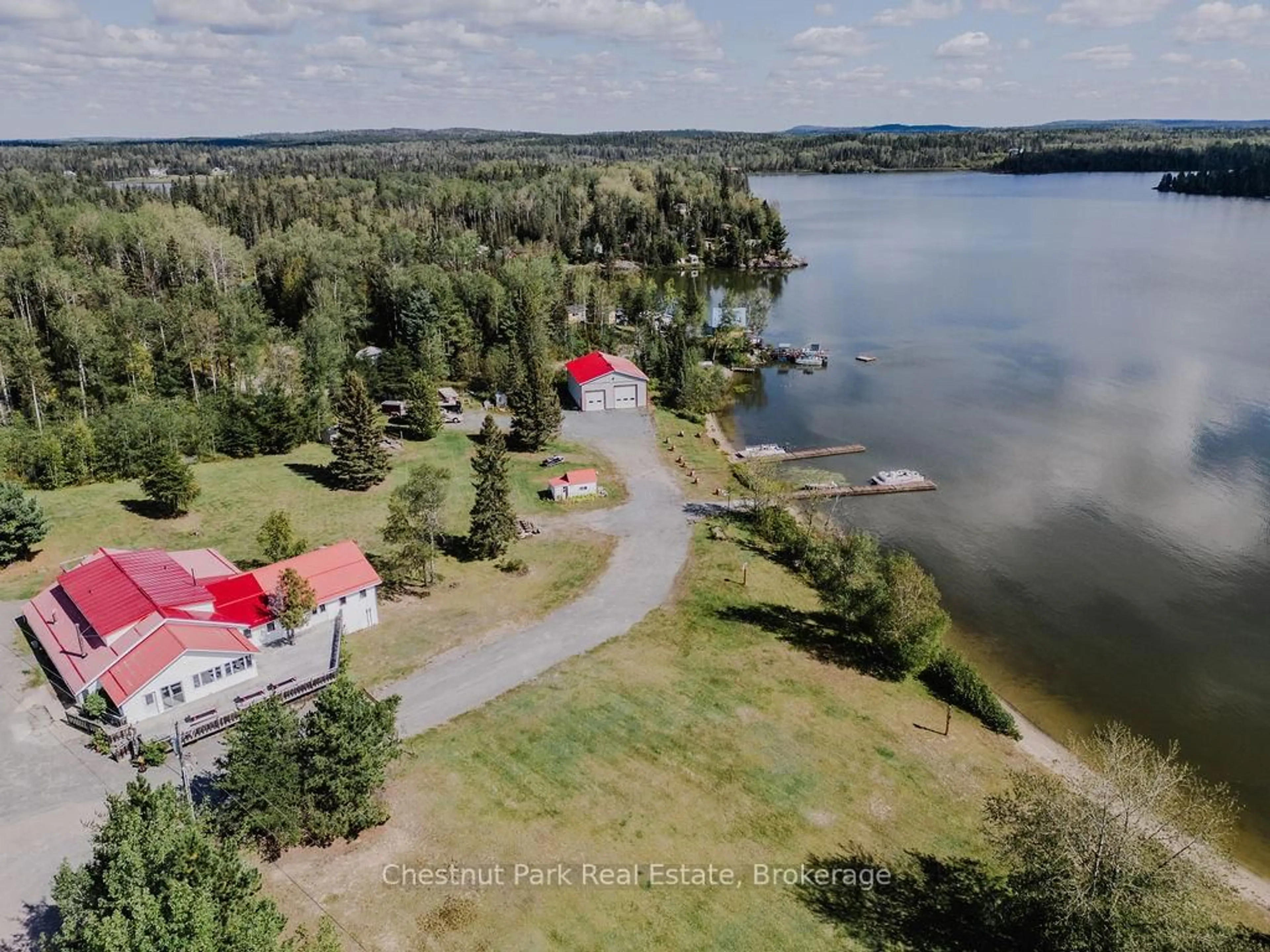A pic from outside/outdoor area/front of a property/back of a property/a pic from drone, water/lake/river/ocean view for 501 Resort Rd, Kirkland Lake Ontario P0K 1S0