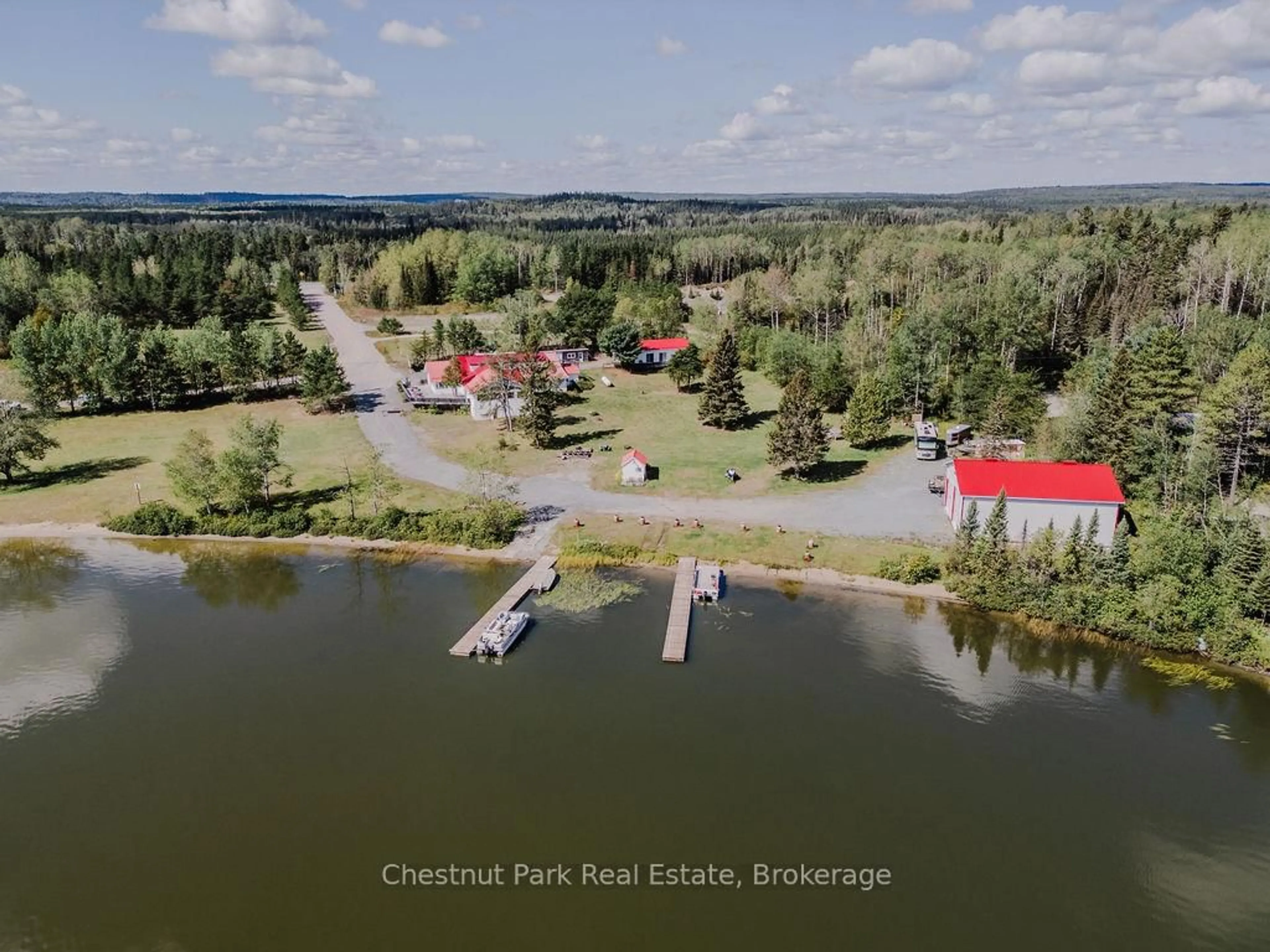 A pic from outside/outdoor area/front of a property/back of a property/a pic from drone, water/lake/river/ocean view for 501 Resort Rd, Kirkland Lake Ontario P0K 1S0