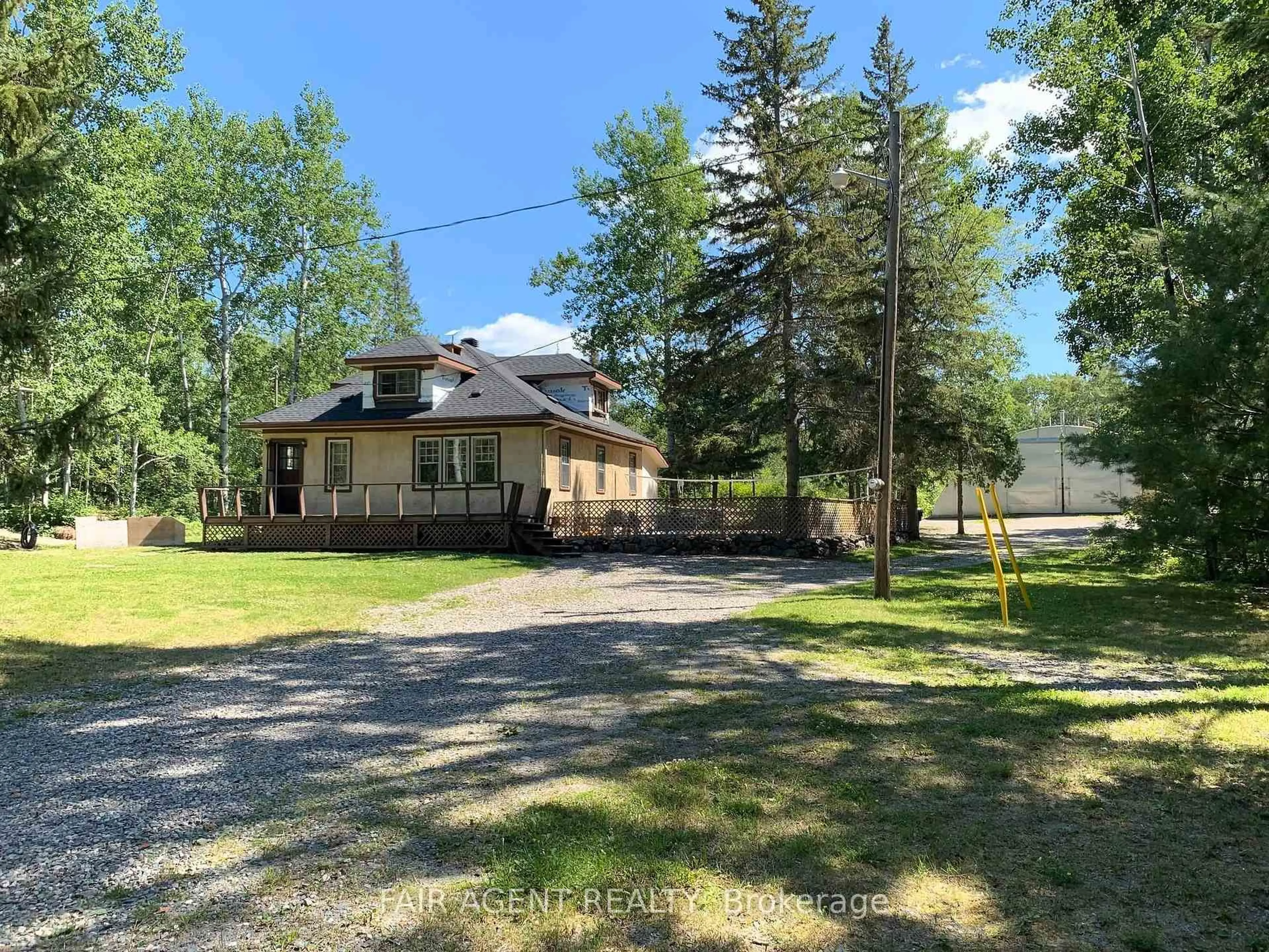 A pic from outside/outdoor area/front of a property/back of a property/a pic from drone, street for 975140 Silver Centre Rd, Temiskaming Shores Ontario P0J 1R0