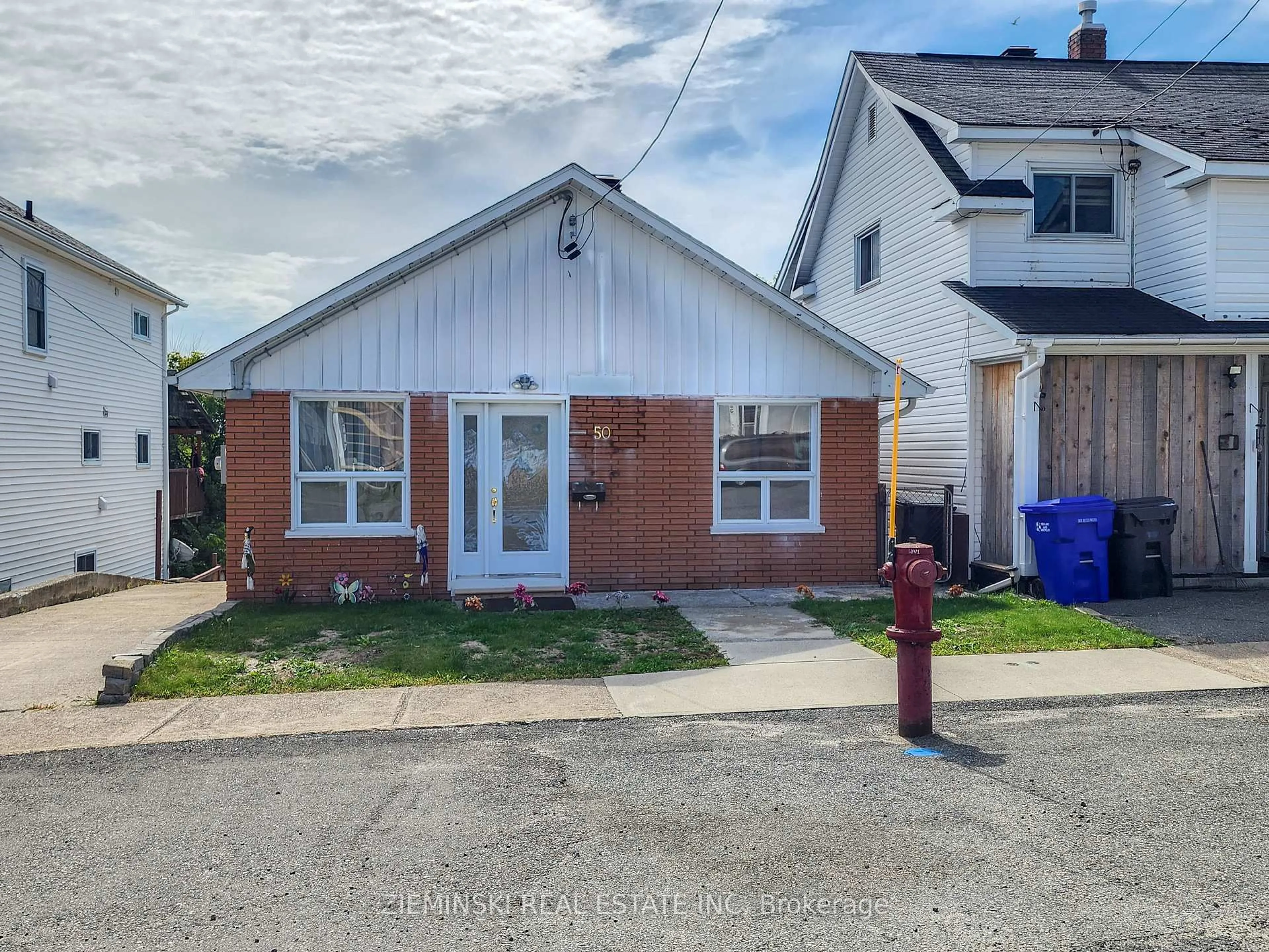 A pic from outside/outdoor area/front of a property/back of a property/a pic from drone, street for 50 Mc Camus Ave, Kirkland Lake Ontario P2N 2J7