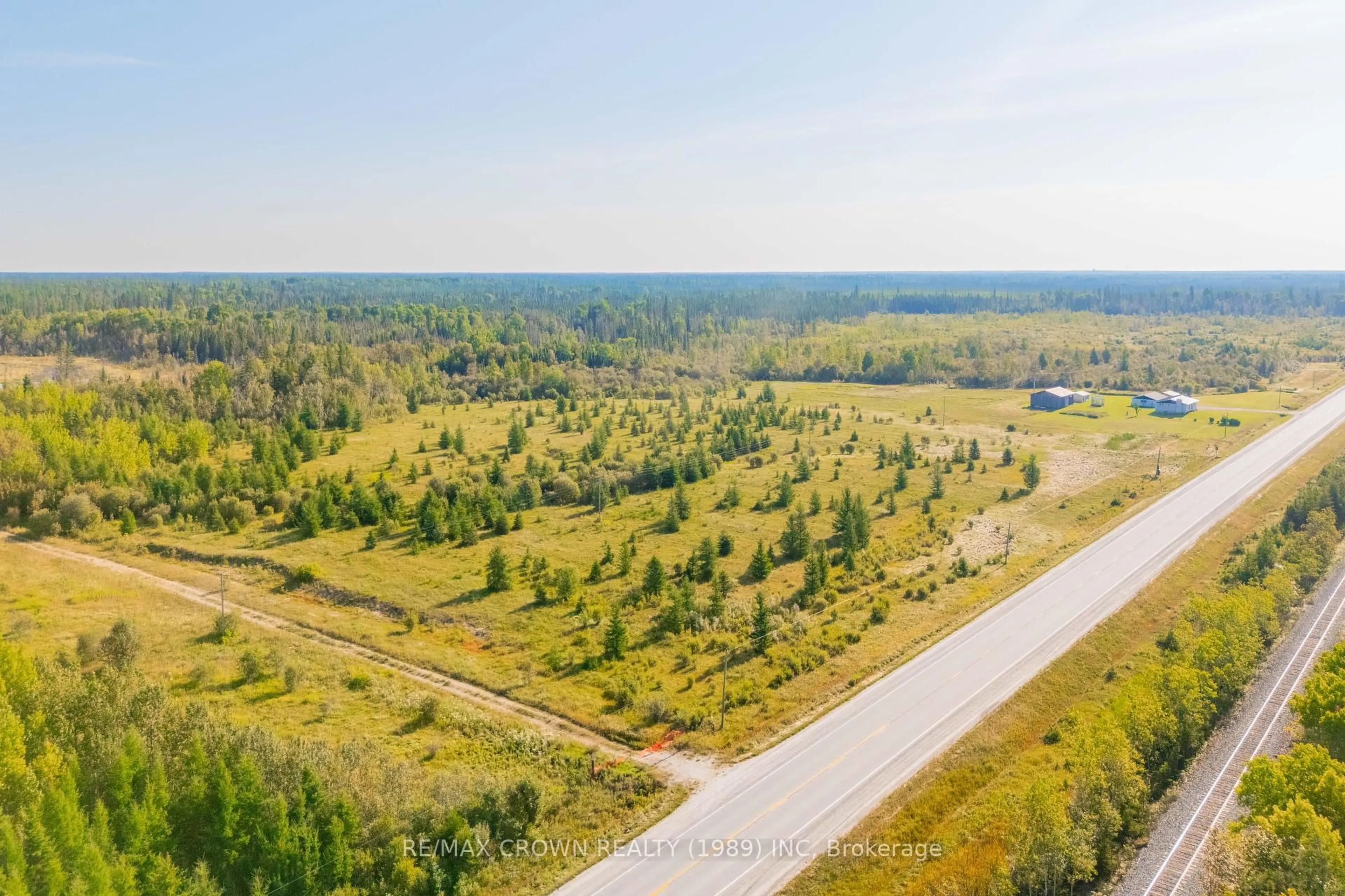 A pic from outside/outdoor area/front of a property/back of a property/a pic from drone, forest/trees view for PCL 3006 LT 14  HIGHWAY 11 #Haggart, Smooth Rock Falls Ontario P0L 2B0