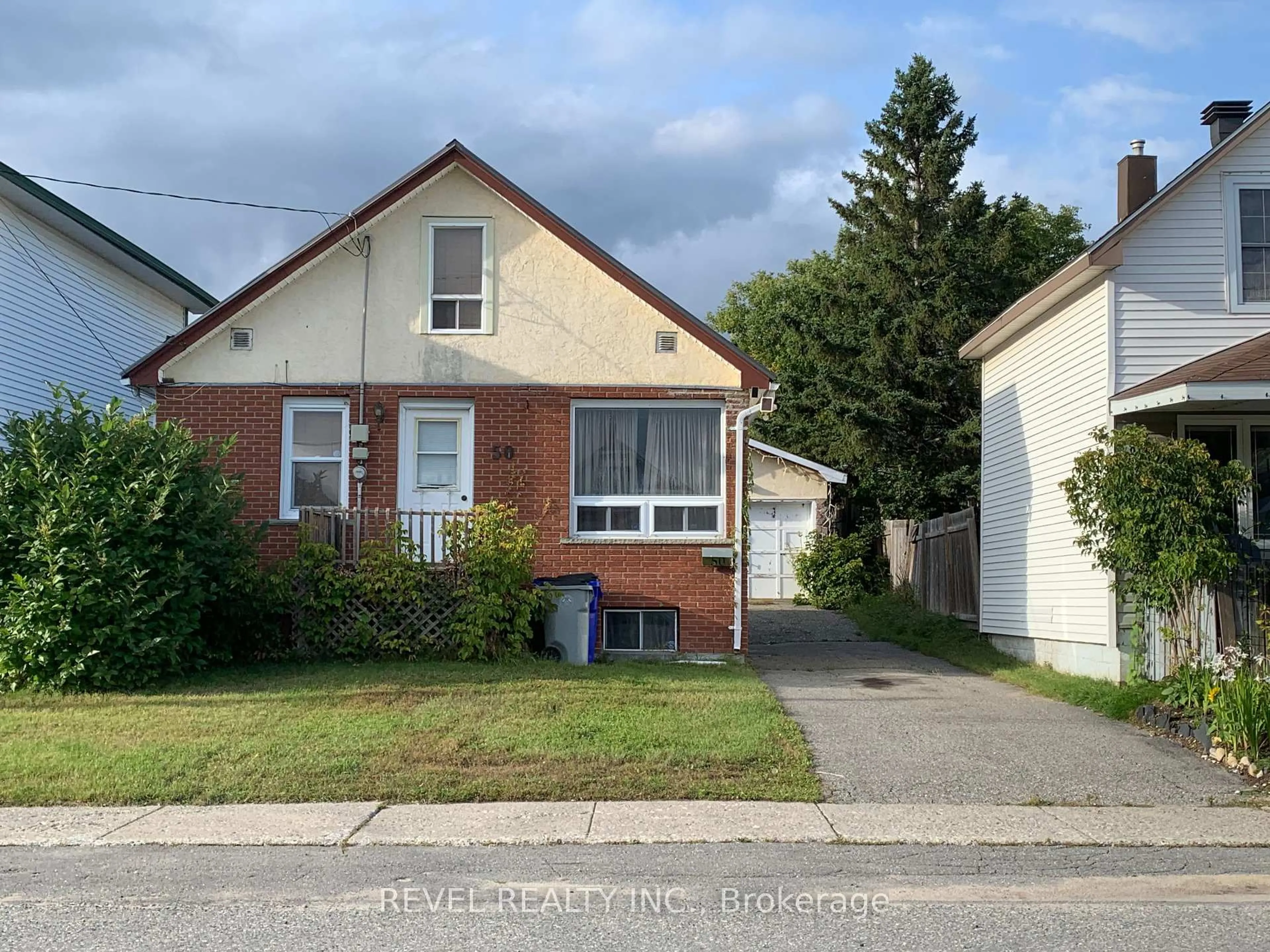 Home with brick exterior material, street for 50 Columbus Ave, Timmins Ontario P4N 3H3