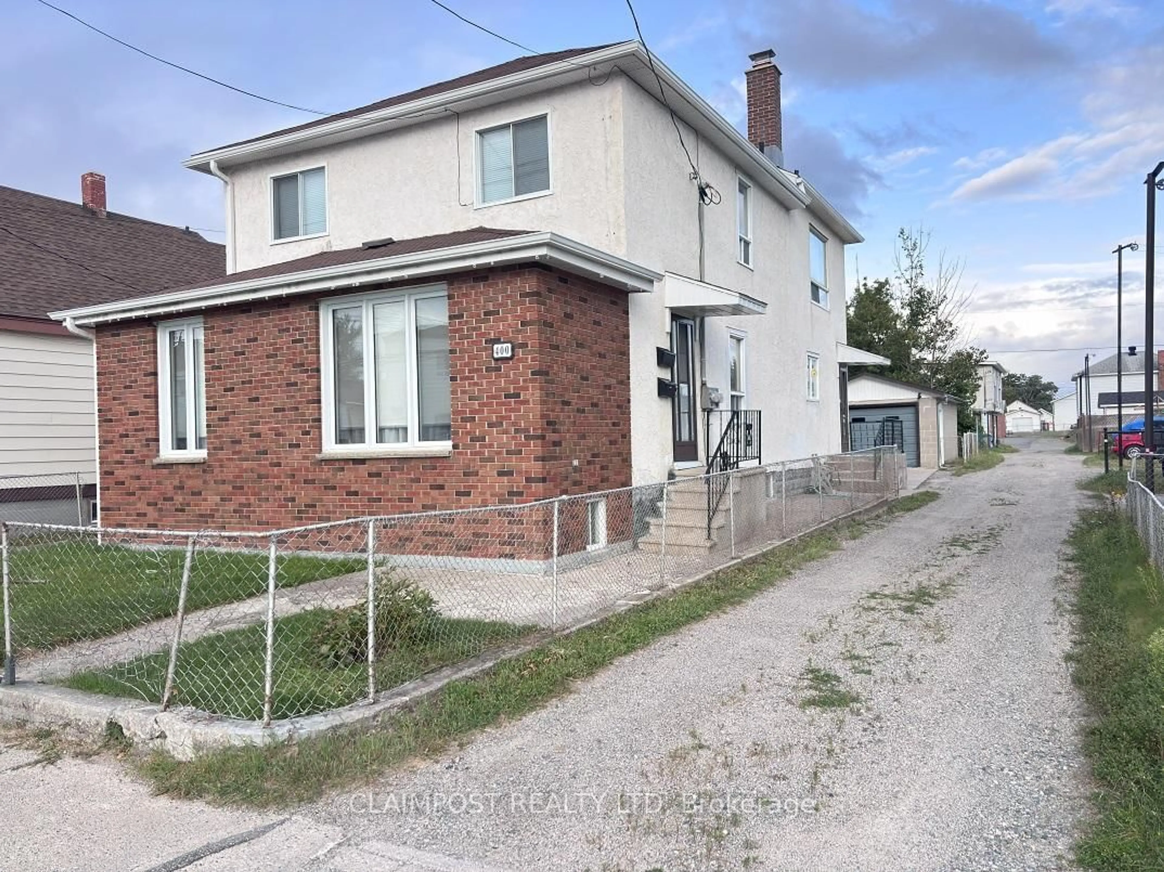 Home with brick exterior material, street for 400 Pine St, Timmins Ontario P4N 2L3