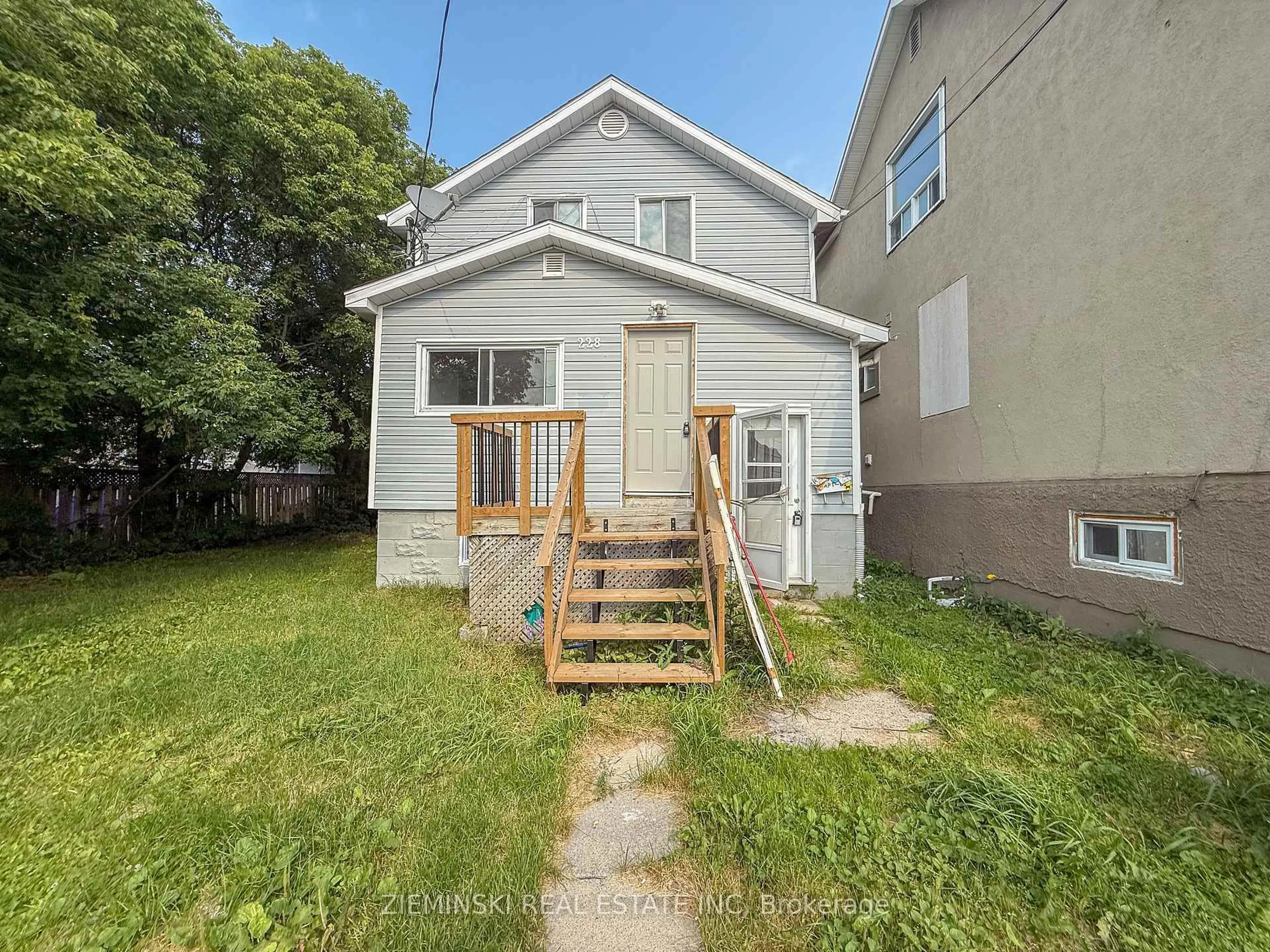 A pic from outside/outdoor area/front of a property/back of a property/a pic from drone, street for 228 Birch St, Timmins Ontario P4N 6E5