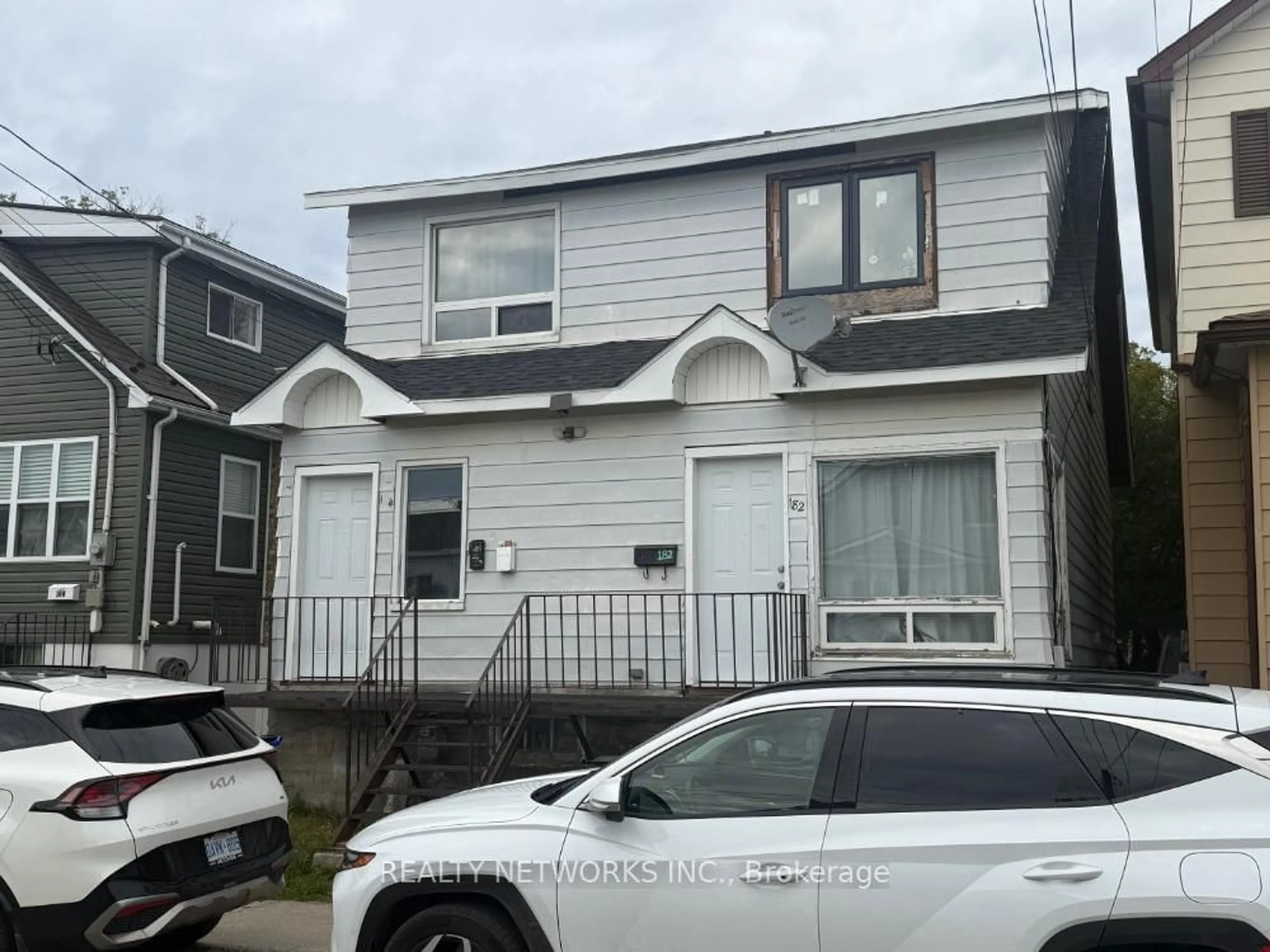 Home with vinyl exterior material, street for 184 Cedar St, Timmins Ontario P4N 6J3