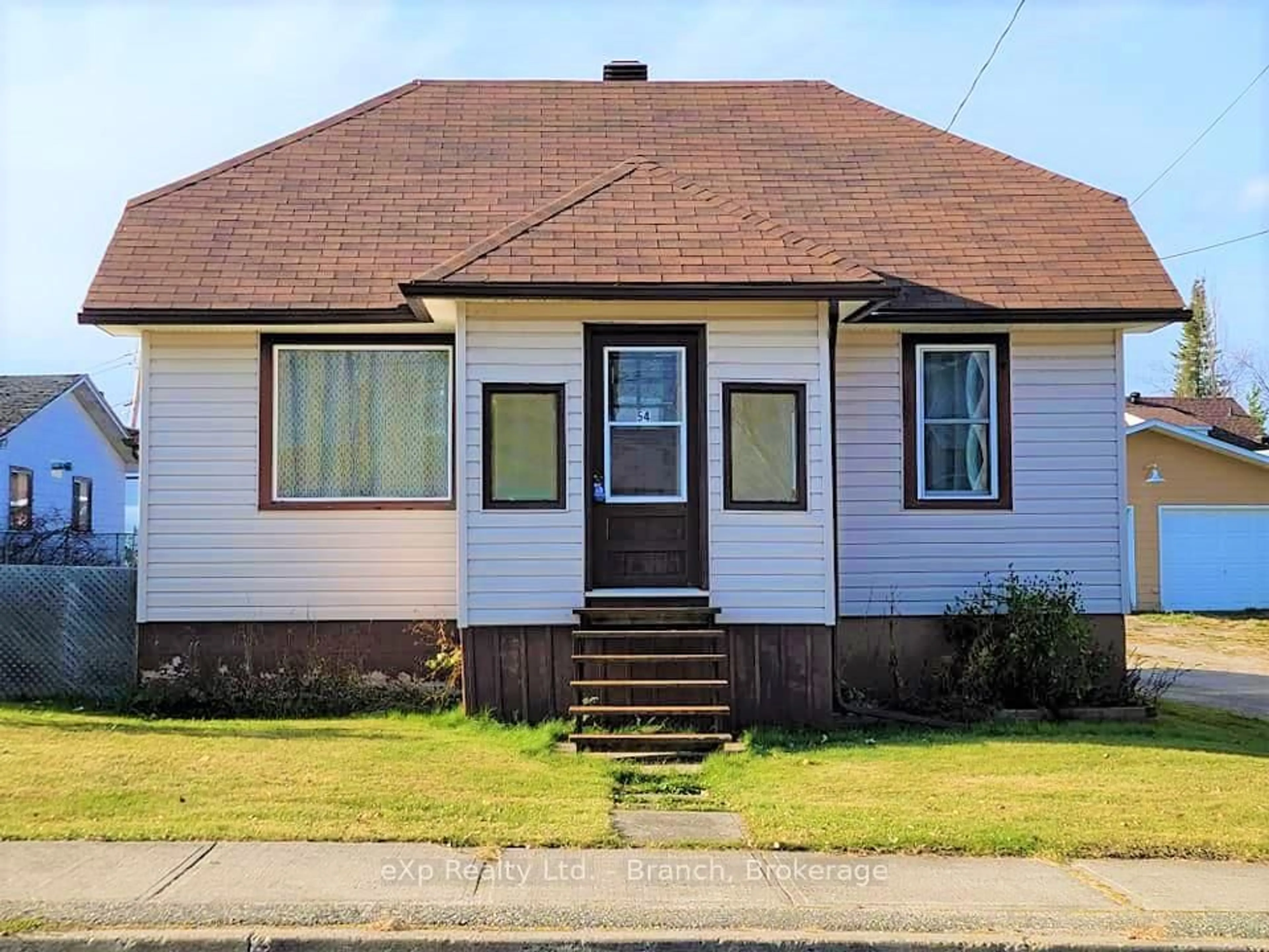 Home with vinyl exterior material, street for 54 Sixth St, Smooth Rock Falls Ontario P0L 2B0