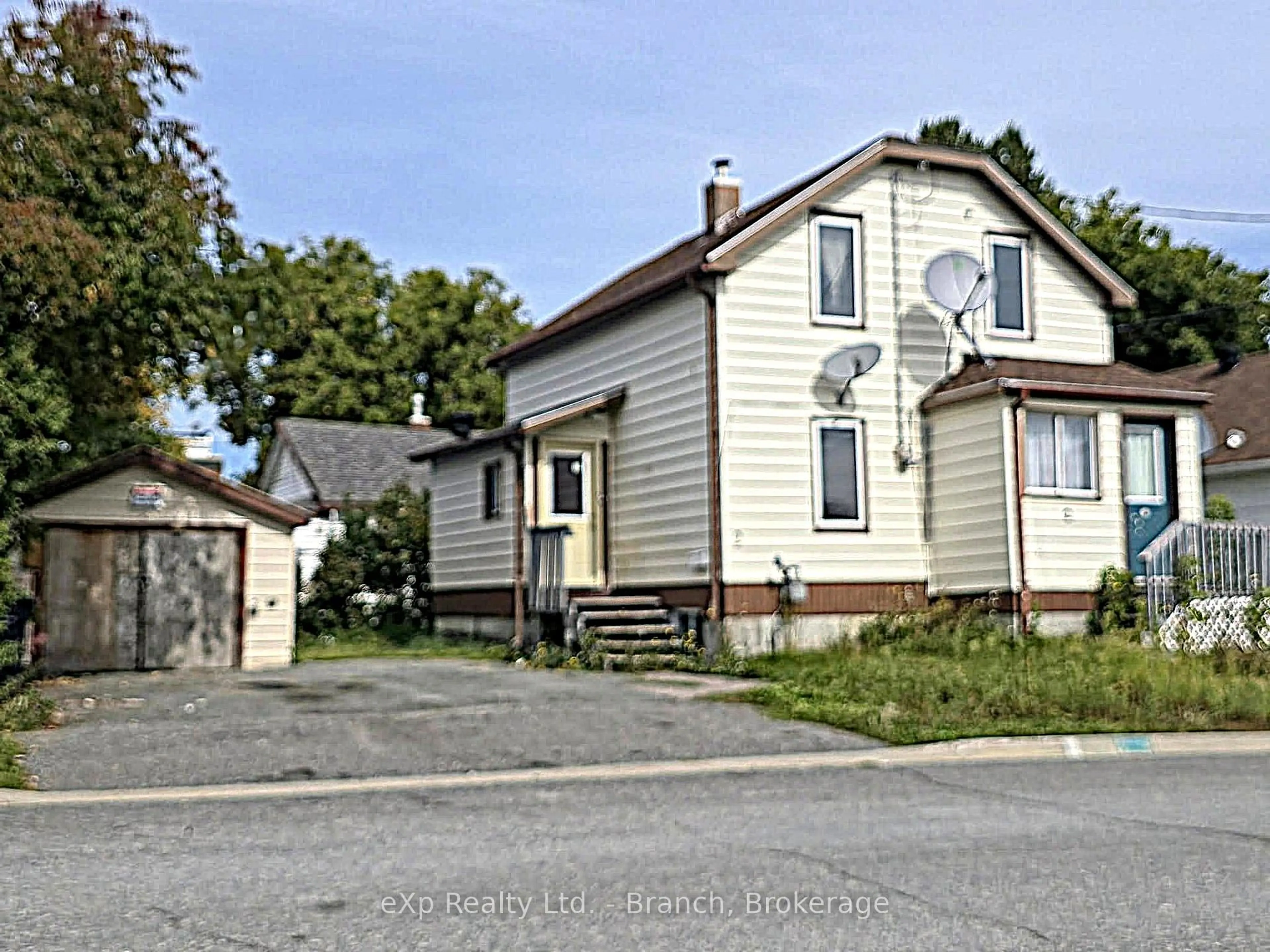 A pic from outside/outdoor area/front of a property/back of a property/a pic from drone, street for 2 Dixon Ave, Kirkland Lake Ontario P2N 1V8