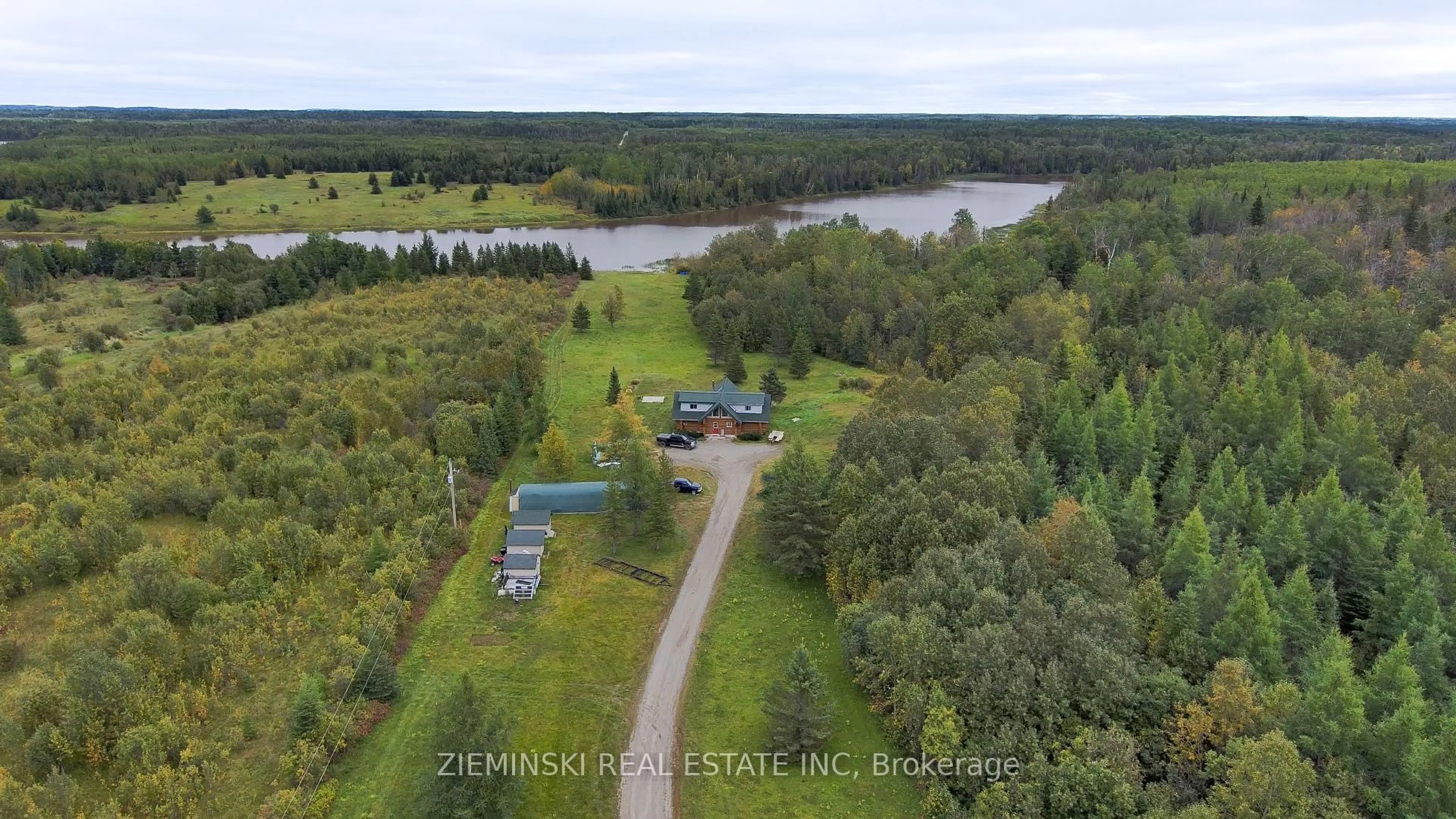 A pic from outside/outdoor area/front of a property/back of a property/a pic from drone, water/lake/river/ocean view for 4621 Frederick House Lake Rd, Timmins Ontario P0N 1A0