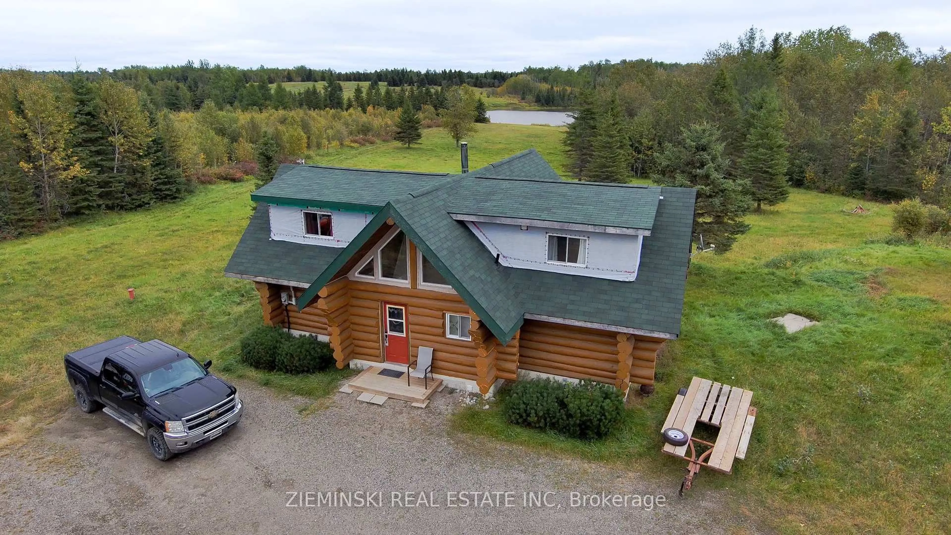 A pic from outside/outdoor area/front of a property/back of a property/a pic from drone, water/lake/river/ocean view for 4621 Frederick House Lake Rd, Timmins Ontario P0N 1A0
