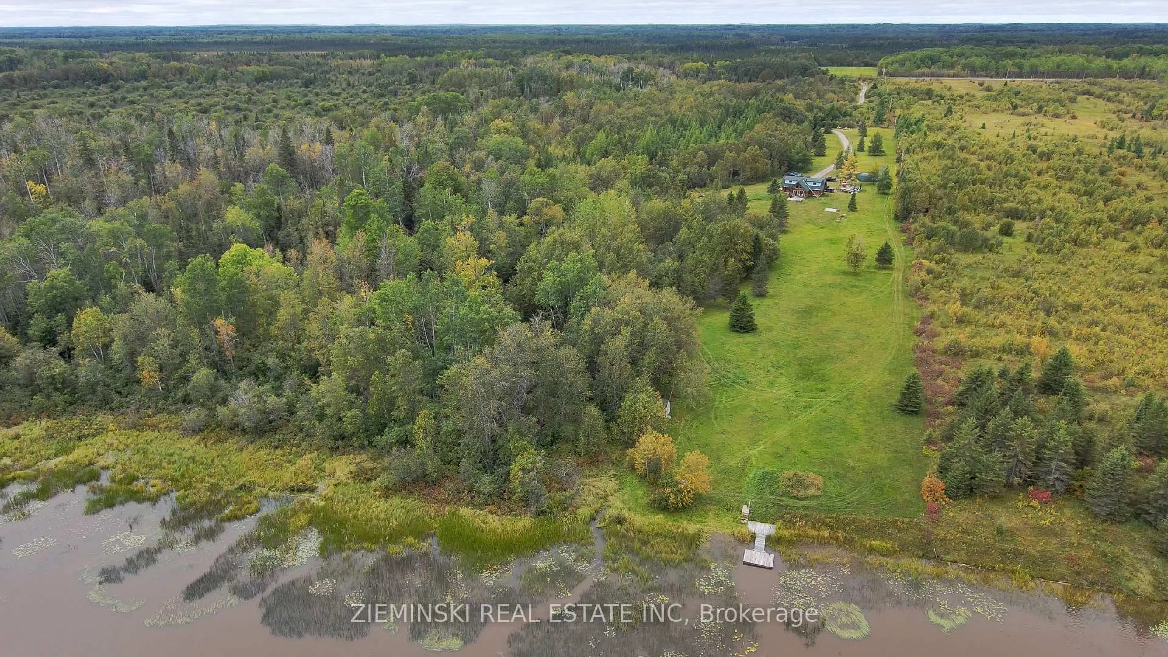 A pic from outside/outdoor area/front of a property/back of a property/a pic from drone, water/lake/river/ocean view for 4621 Frederick House Lake Rd, Timmins Ontario P0N 1A0