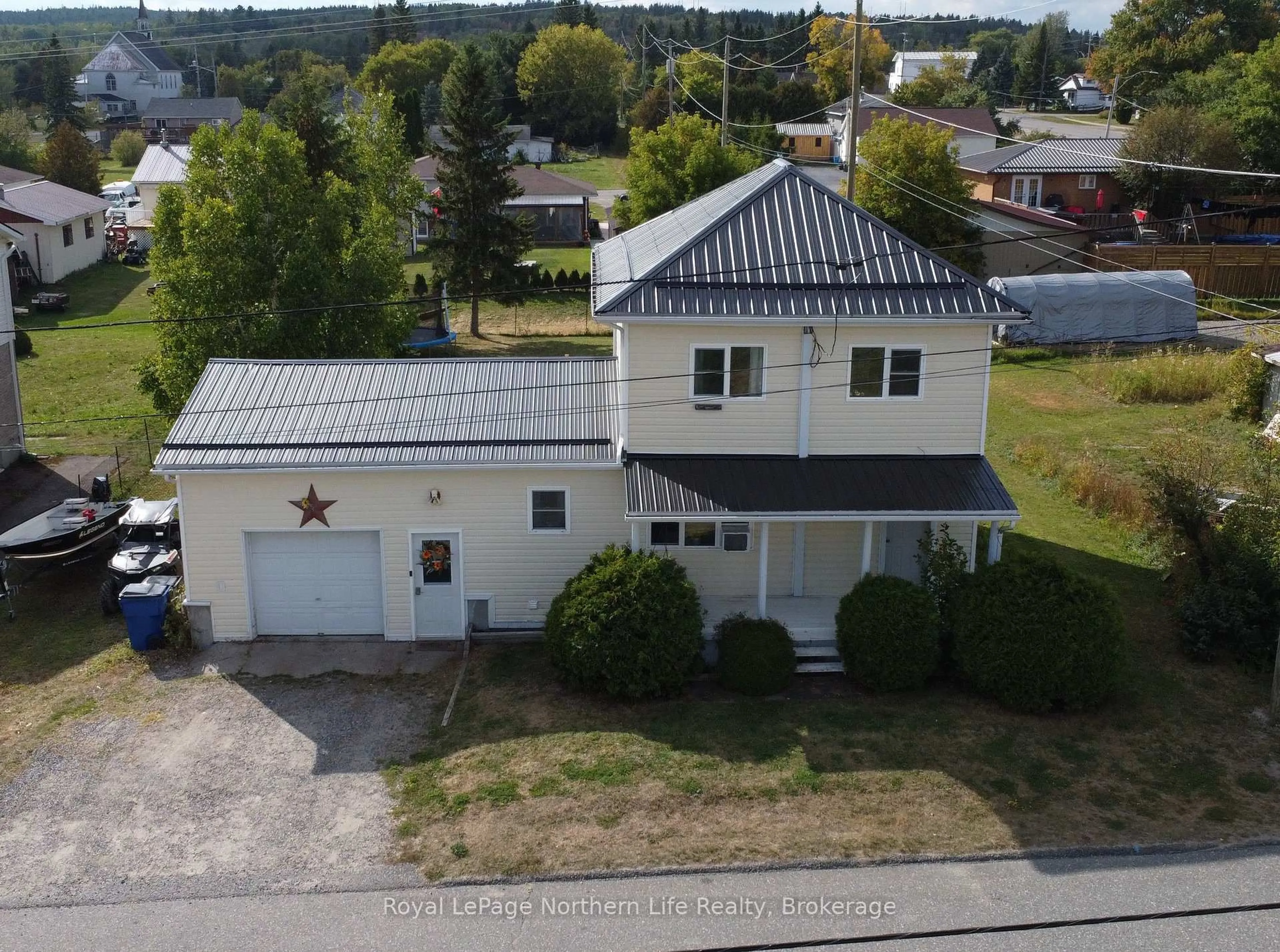 A pic from outside/outdoor area/front of a property/back of a property/a pic from drone, street for 67 Birch St, Temiskaming Shores Ontario P0H 1K0