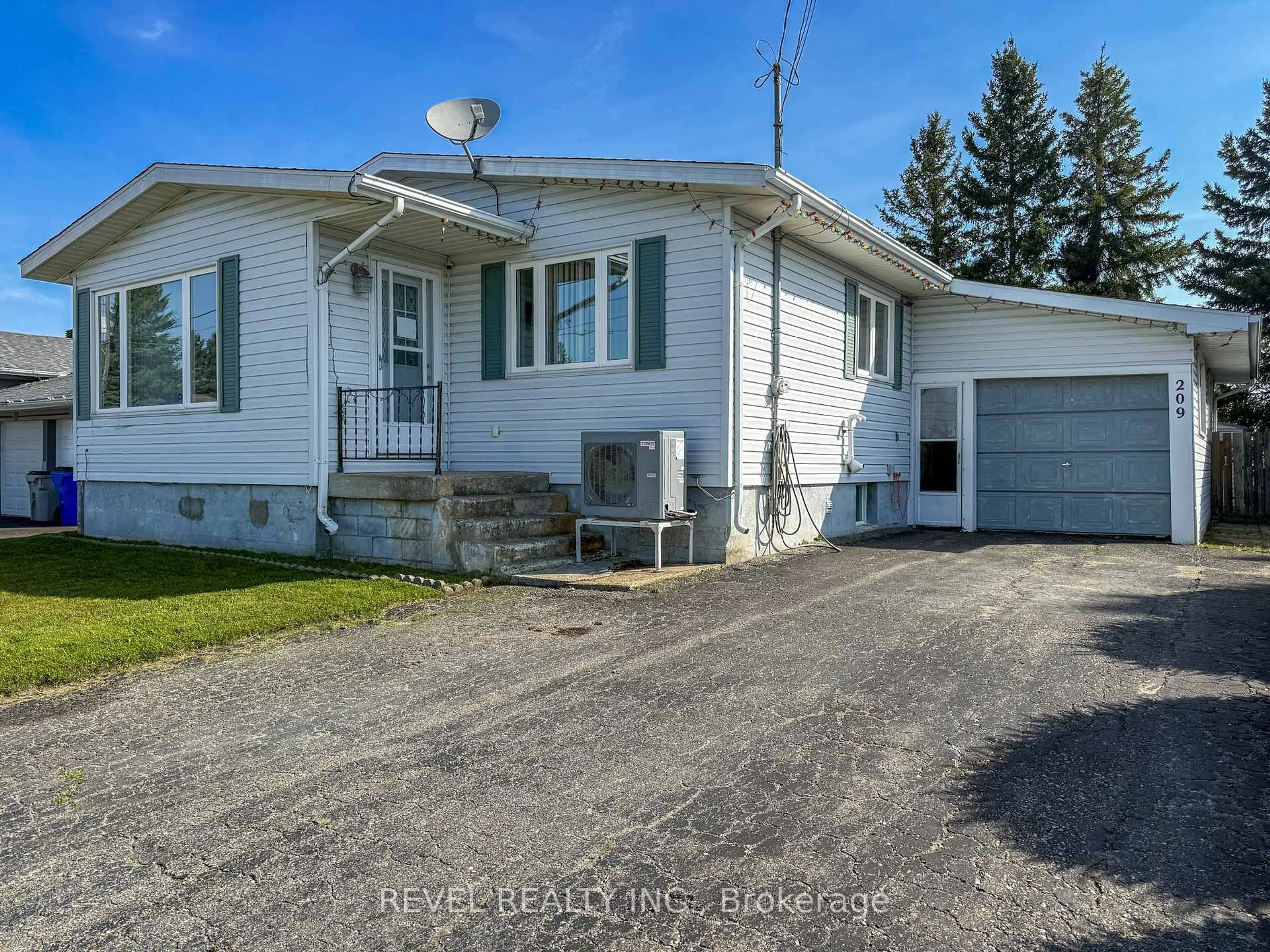 A pic from outside/outdoor area/front of a property/back of a property/a pic from drone, street for 209 Ottolen St, Timmins Ontario P0N 1C0