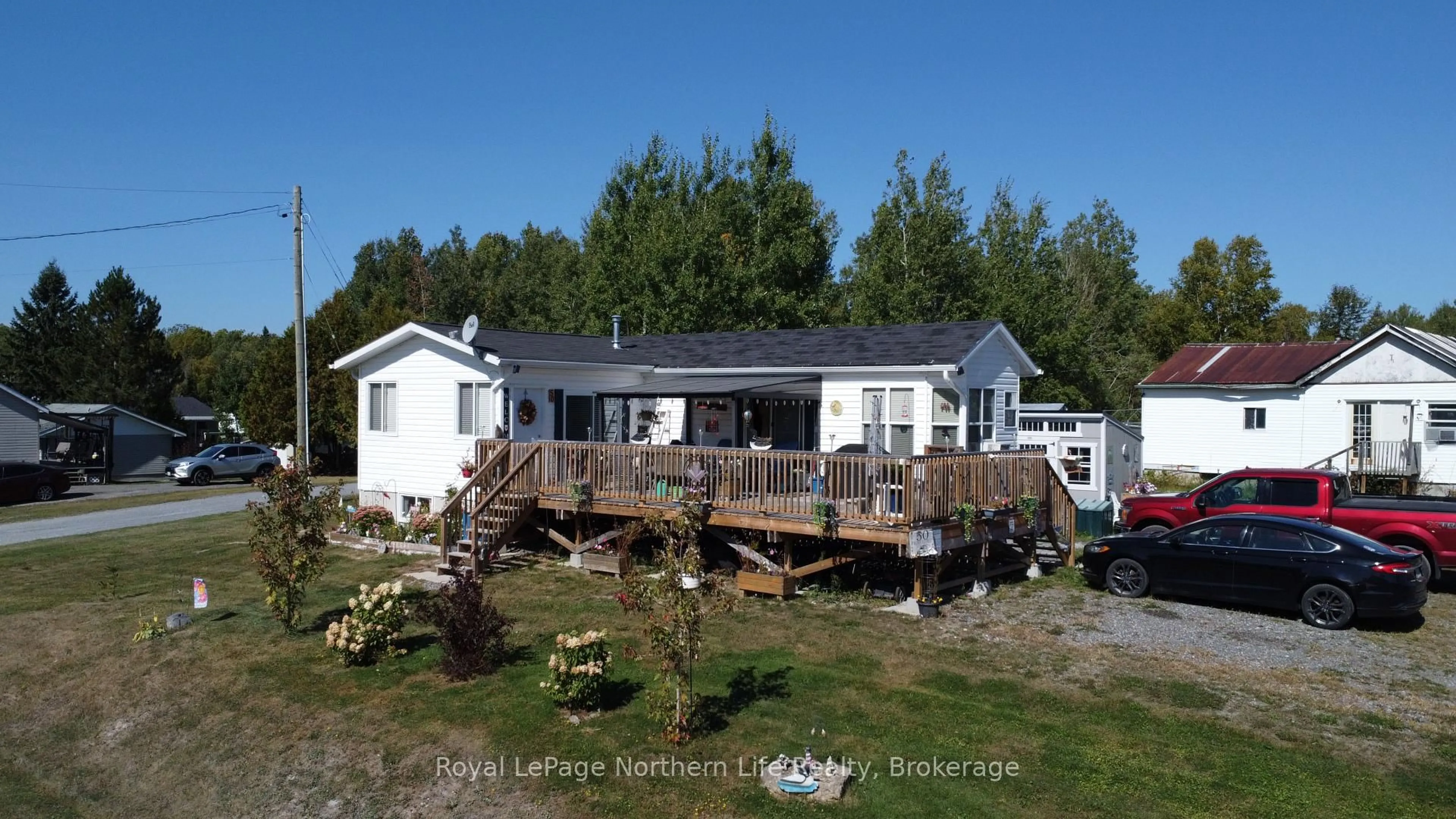 A pic from outside/outdoor area/front of a property/back of a property/a pic from drone, building for 50 PROULX St, Timiskaming Ontario P0J 1N0