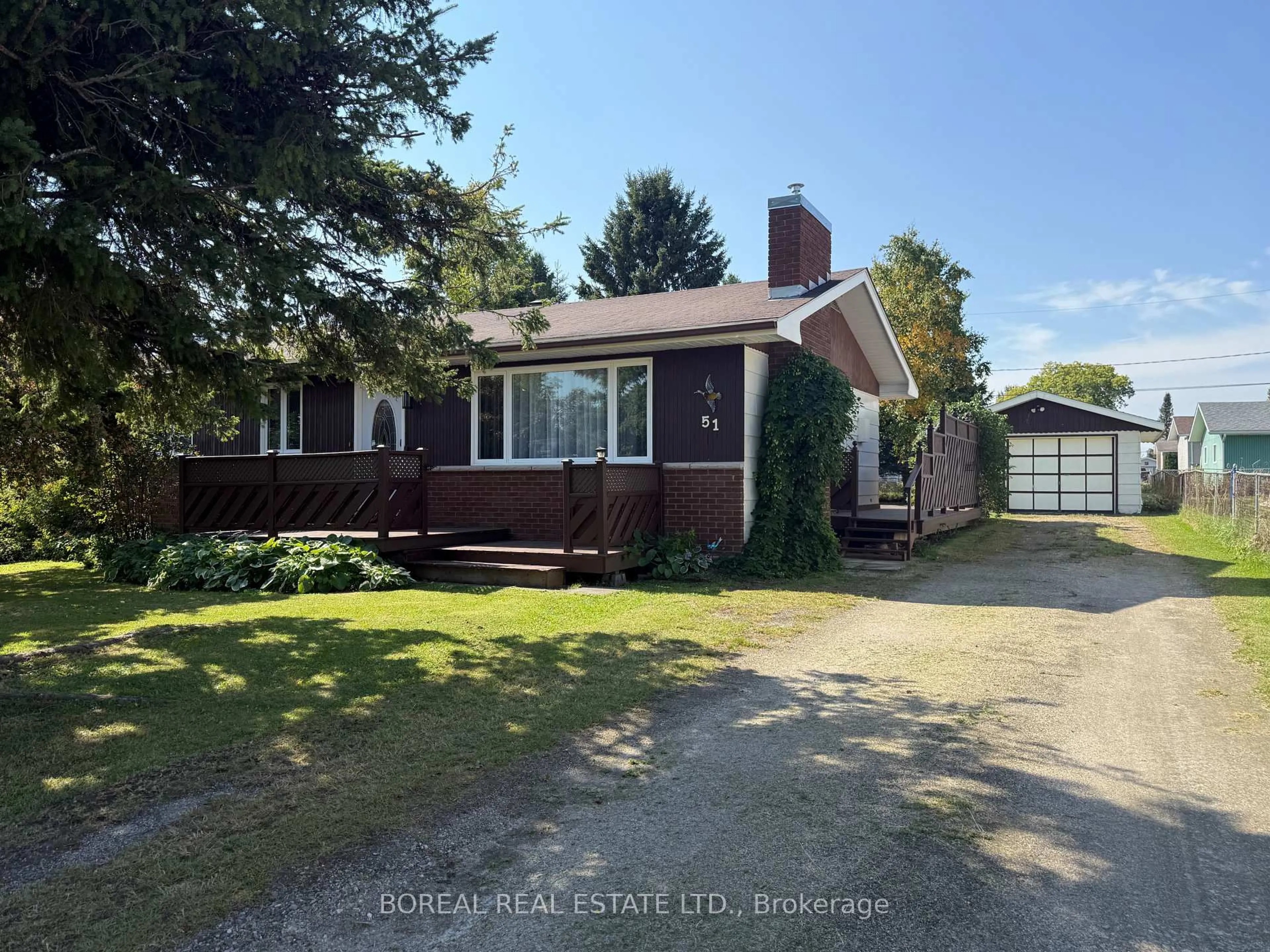 A pic from outside/outdoor area/front of a property/back of a property/a pic from drone, street for 51 Victoria Ave, Cochrane Ontario P0L 1C0