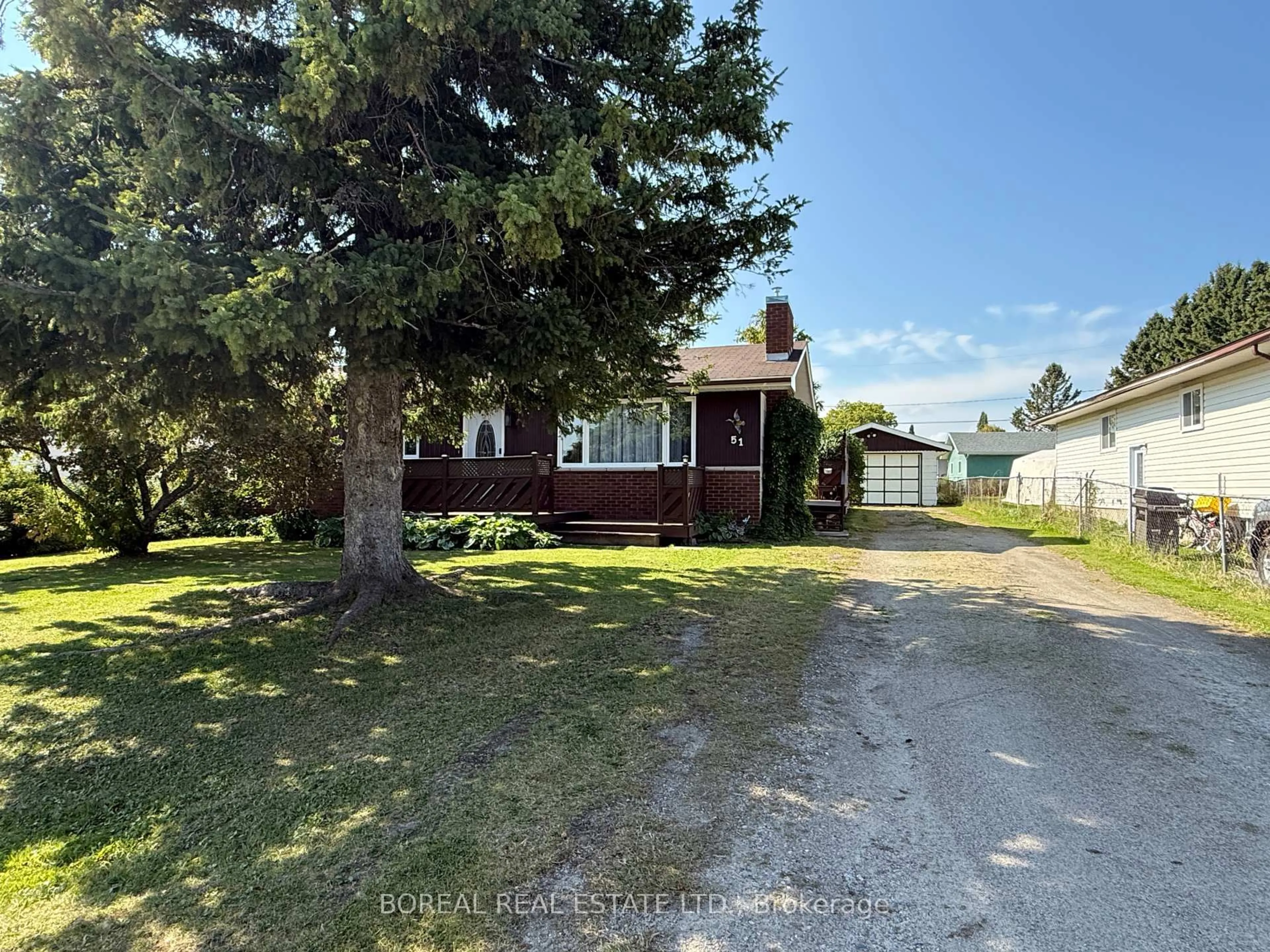 A pic from outside/outdoor area/front of a property/back of a property/a pic from drone, street for 51 Victoria Ave, Cochrane Ontario P0L 1C0