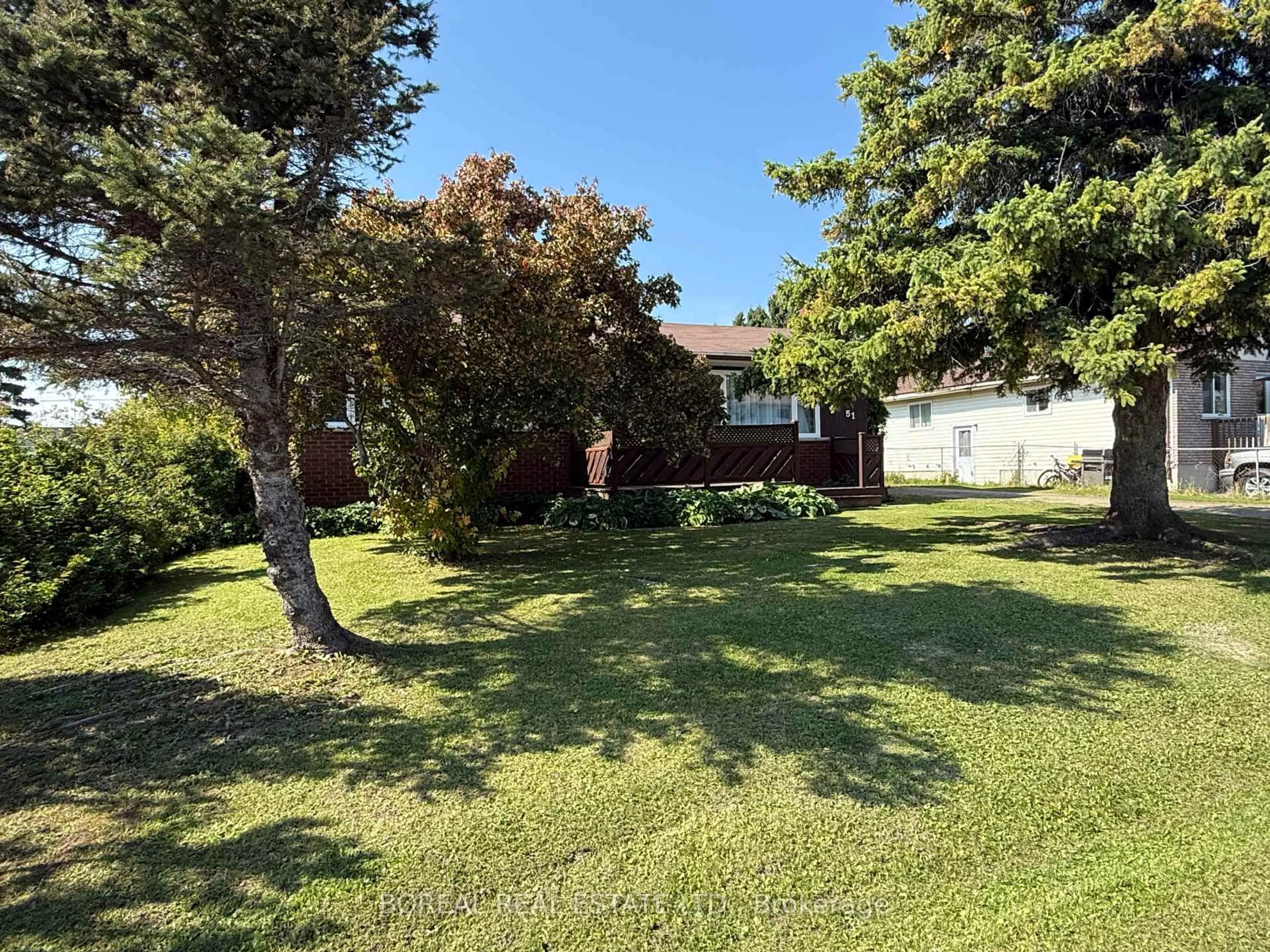 A pic from outside/outdoor area/front of a property/back of a property/a pic from drone, unknown for 51 Victoria Ave, Cochrane Ontario P0L 1C0