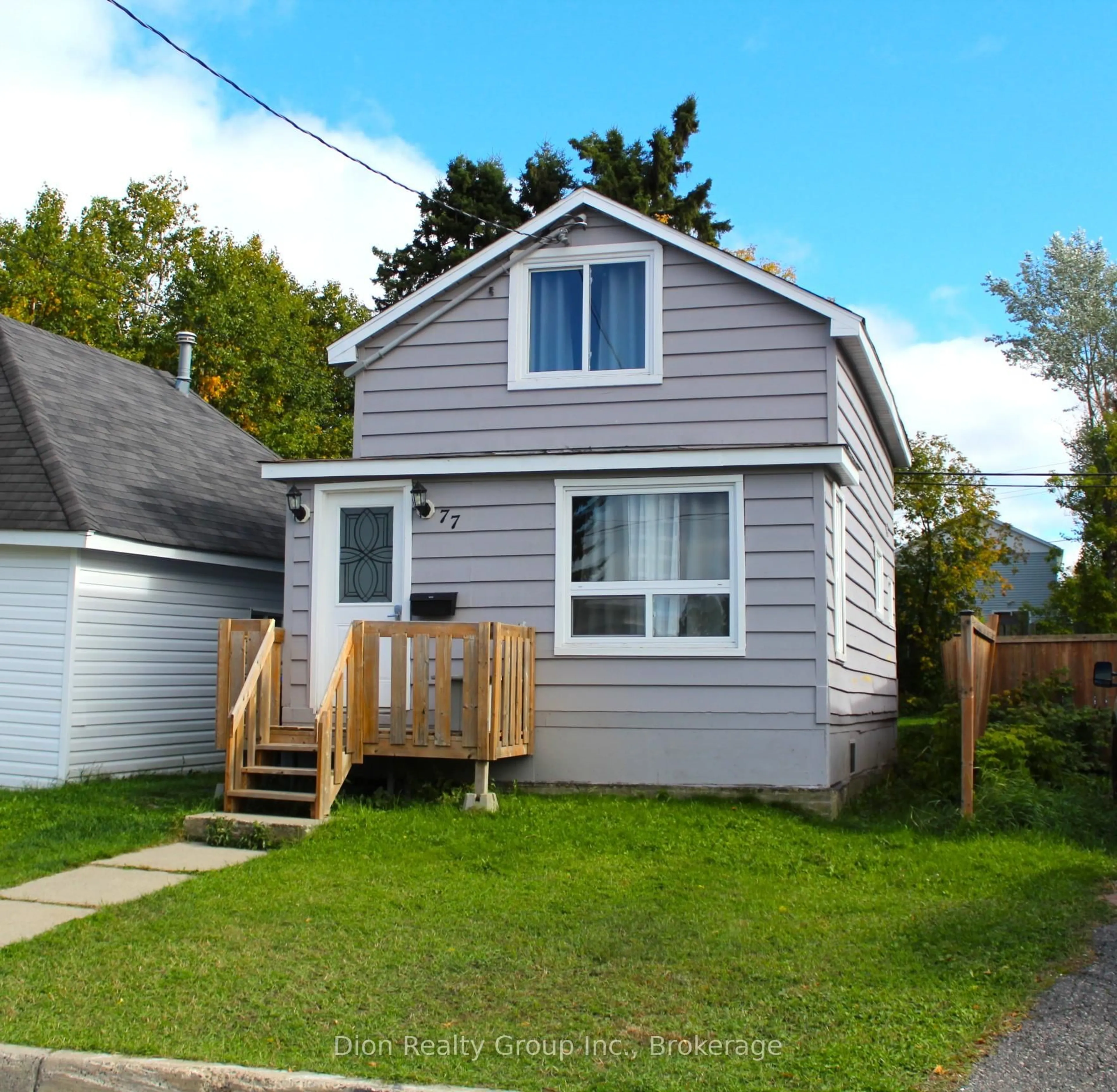 Home with vinyl exterior material, street for 77 Third St, Kirkland Lake Ontario P2N 1S6