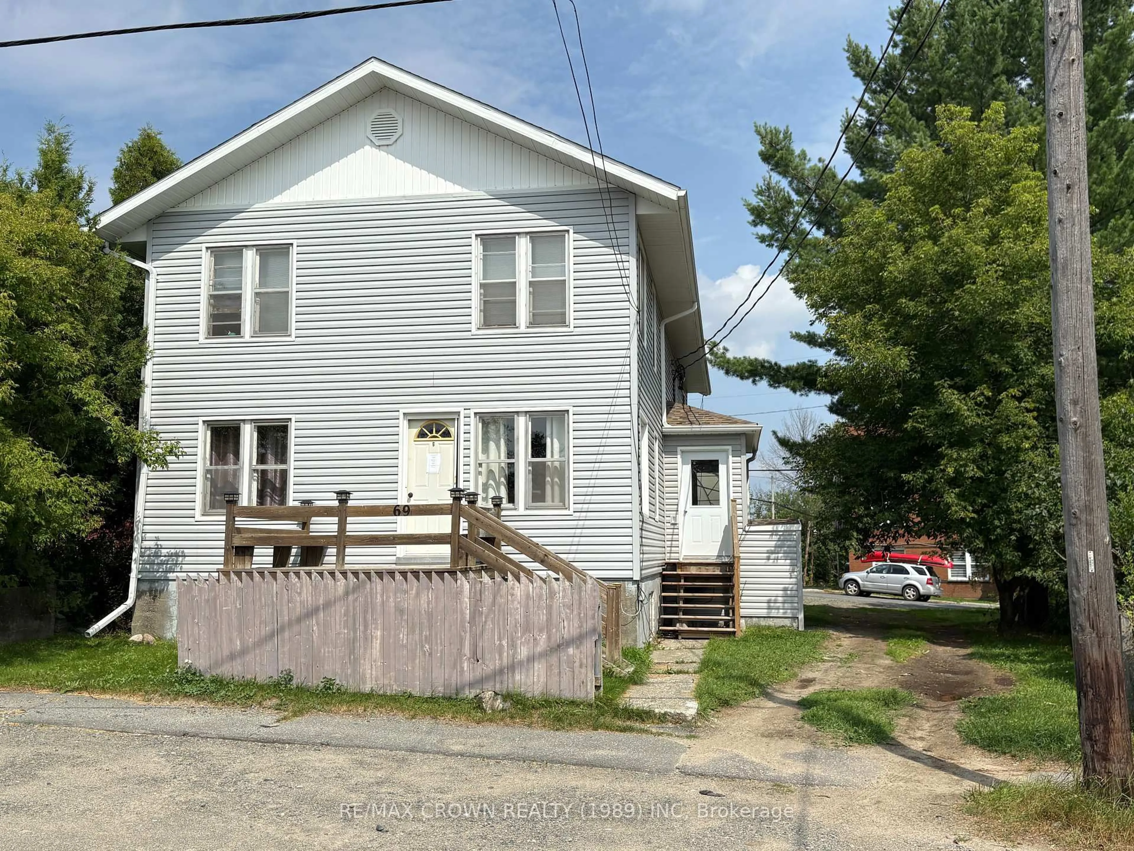 A pic from outside/outdoor area/front of a property/back of a property/a pic from drone, street for 69 McCamus Ave, Kirkland Lake Ontario P2N 2J7