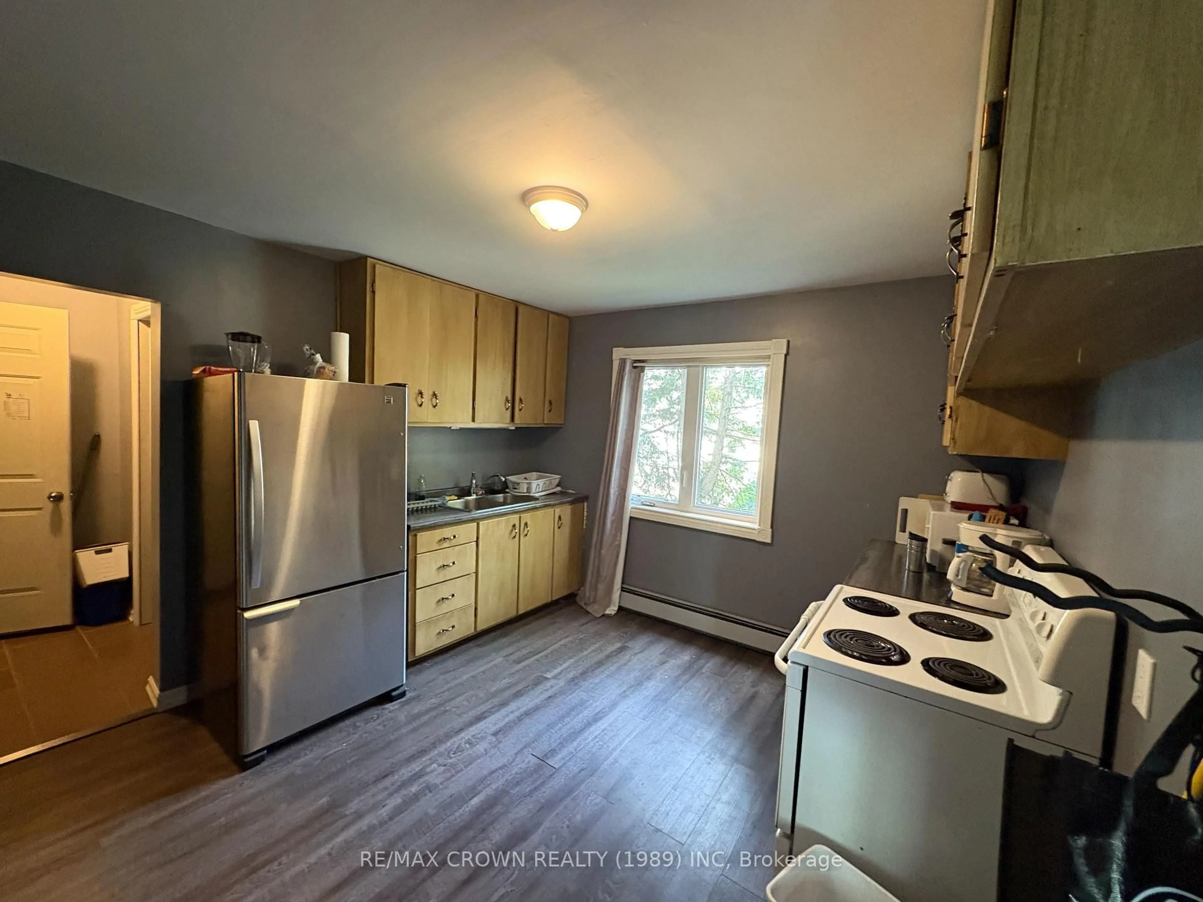 Standard kitchen, wood/laminate floor for 69 McCamus Ave, Kirkland Lake Ontario P2N 2J7
