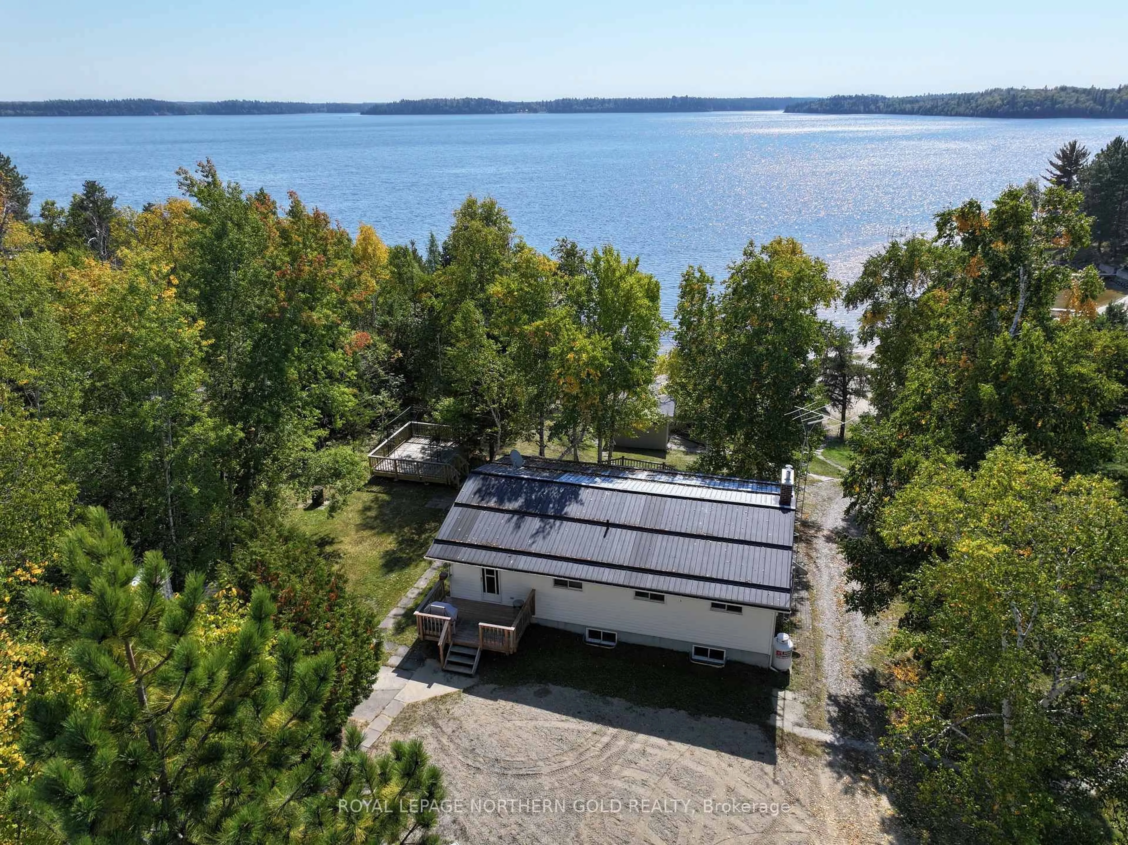 A pic from outside/outdoor area/front of a property/back of a property/a pic from drone, water/lake/river/ocean view for 243 Campground Park Rd, Kirkland Lake Ontario P0K 1G0