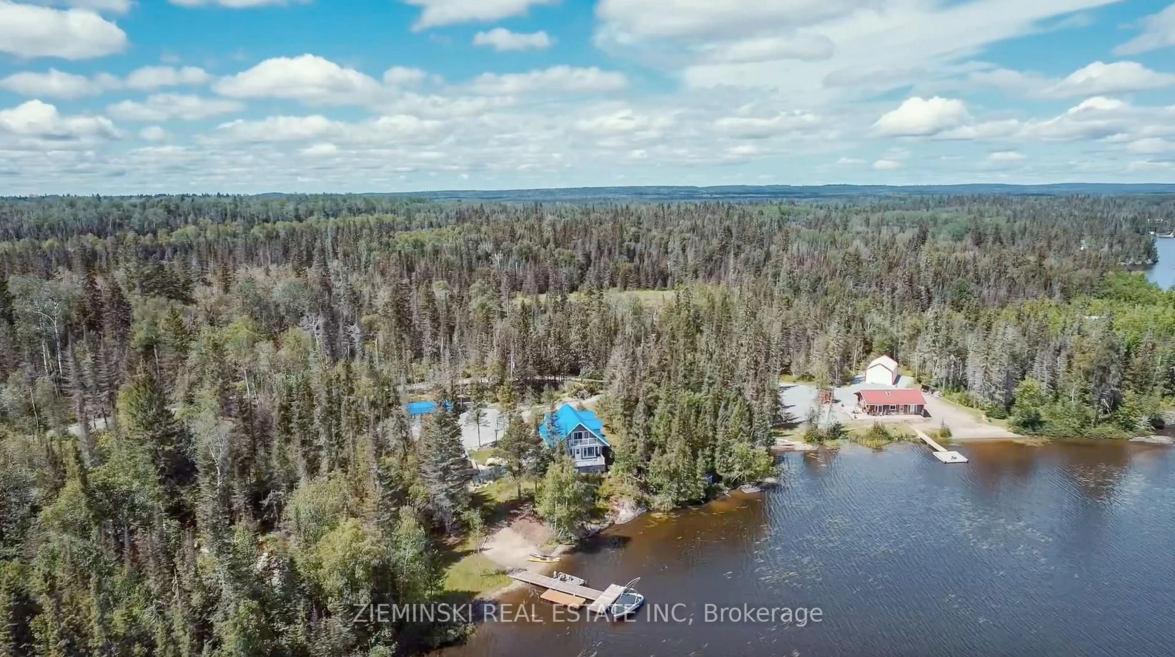 A pic from outside/outdoor area/front of a property/back of a property/a pic from drone, water/lake/river/ocean view for 200 Strada Paradise Rd, Kirkland Lake Ontario P0K 1S0