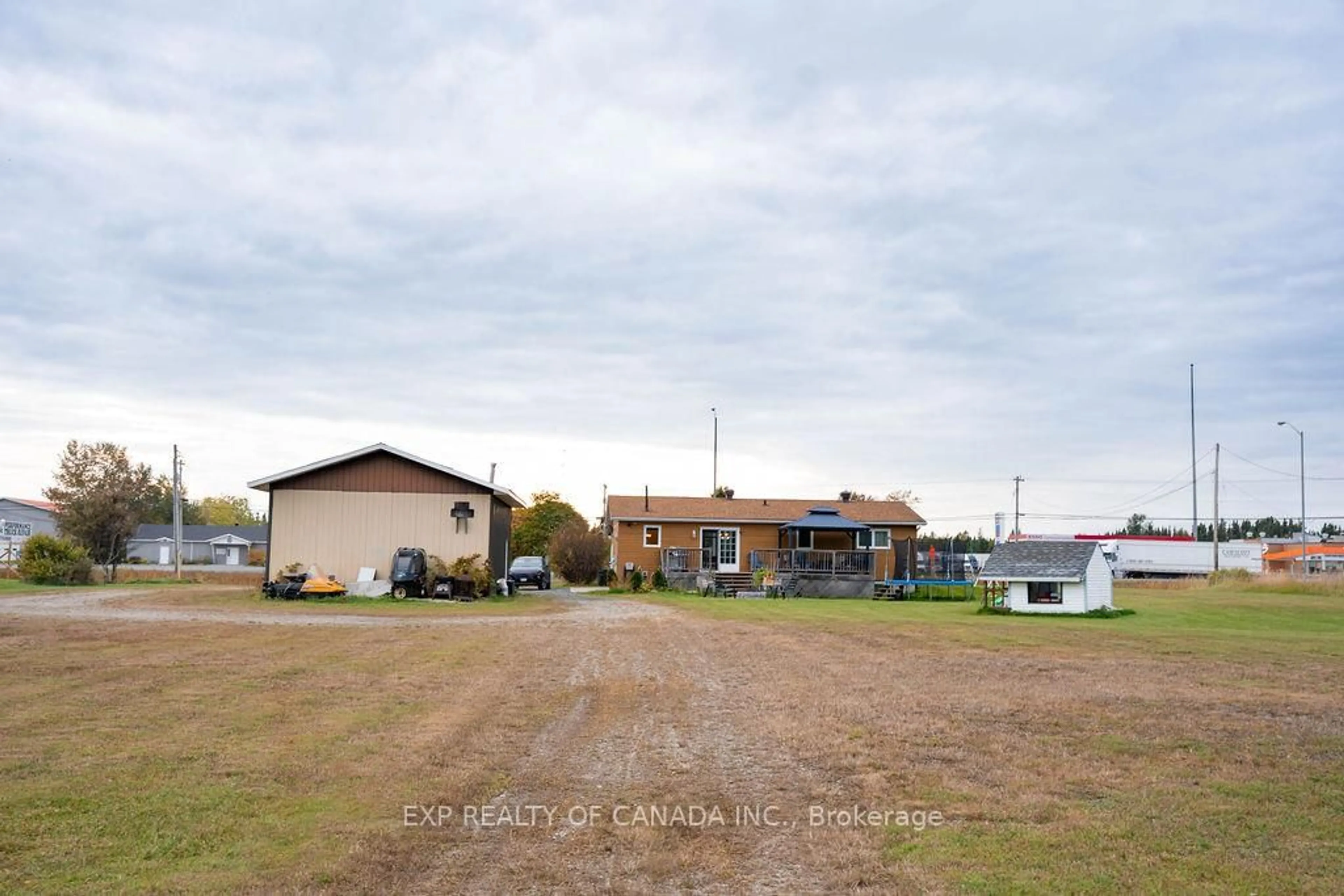 A pic from outside/outdoor area/front of a property/back of a property/a pic from drone, building for 132 Highway No. 11 SOUTH Highway, Cochrane Ontario P0L 1C0