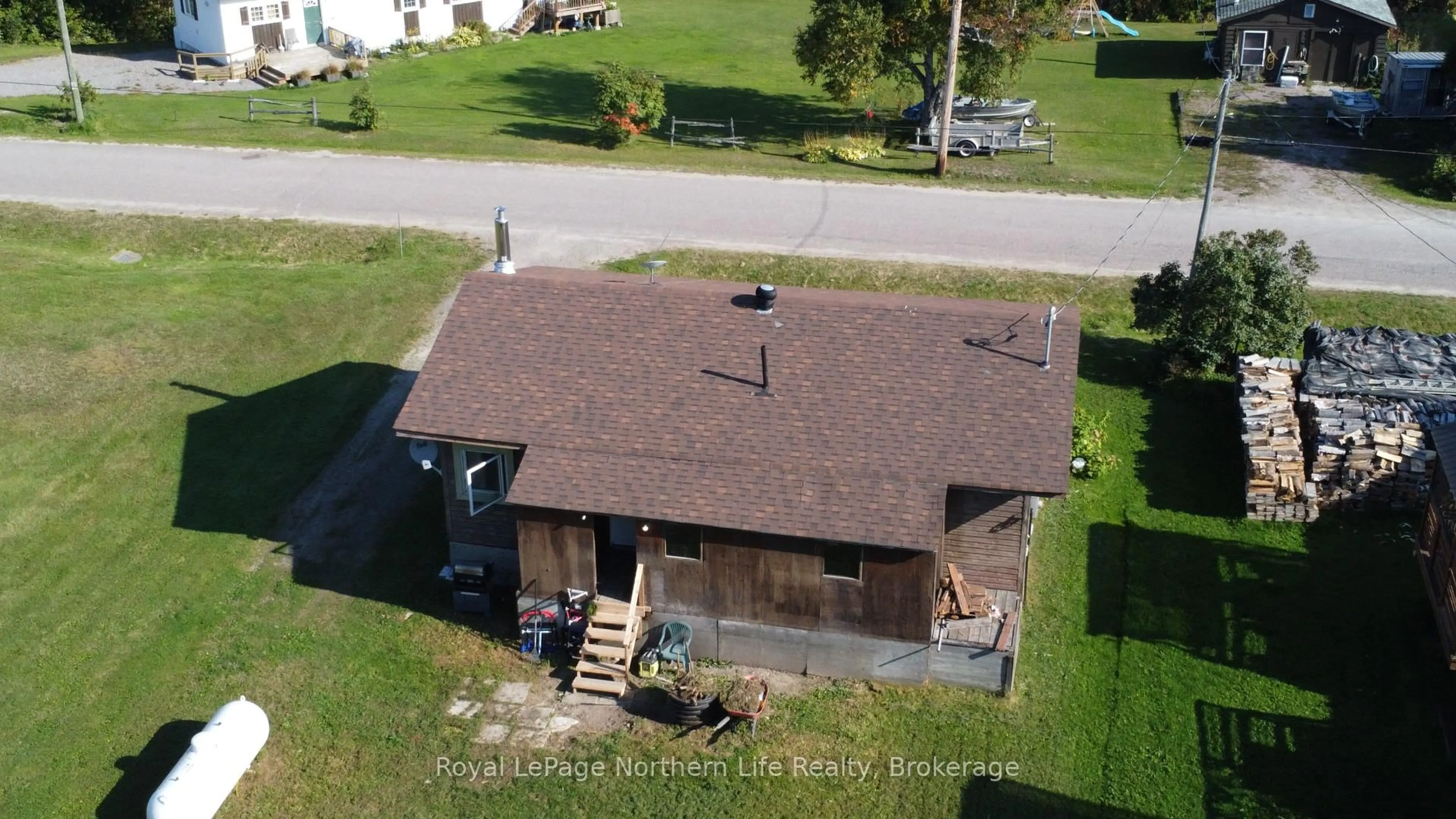 A pic from outside/outdoor area/front of a property/back of a property/a pic from drone, building for 23 4TH St, Timiskaming Ontario P0M 1H0