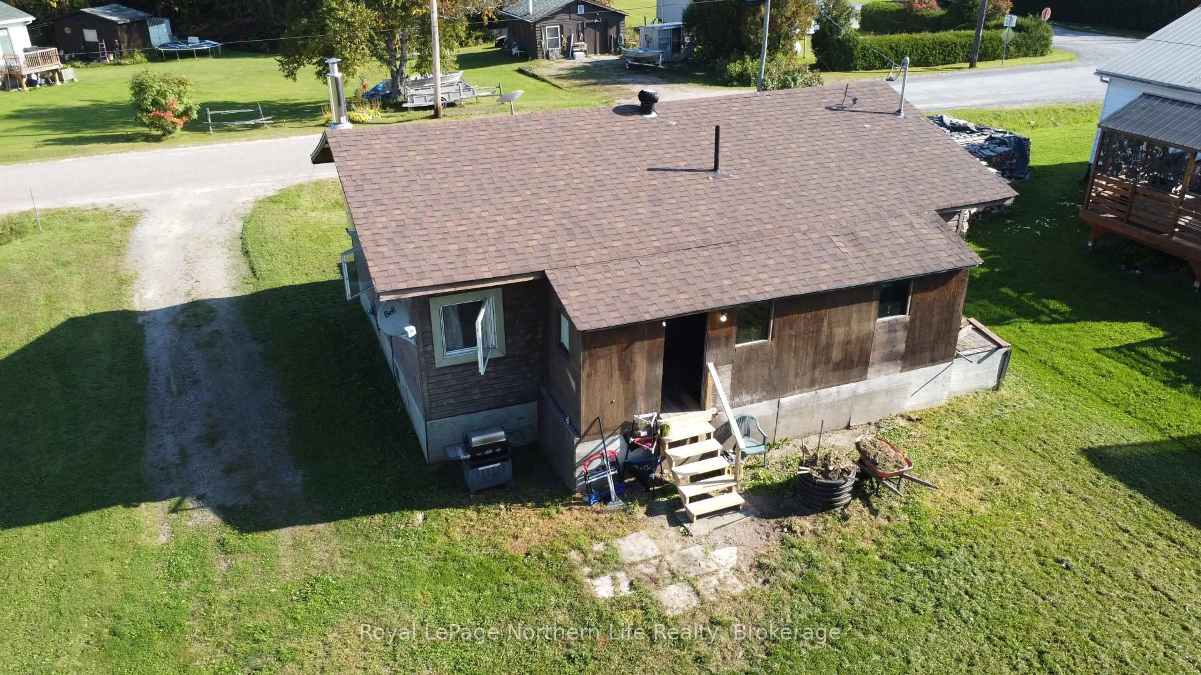 A pic from outside/outdoor area/front of a property/back of a property/a pic from drone, building for 23 4TH St, Timiskaming Ontario P0M 1H0
