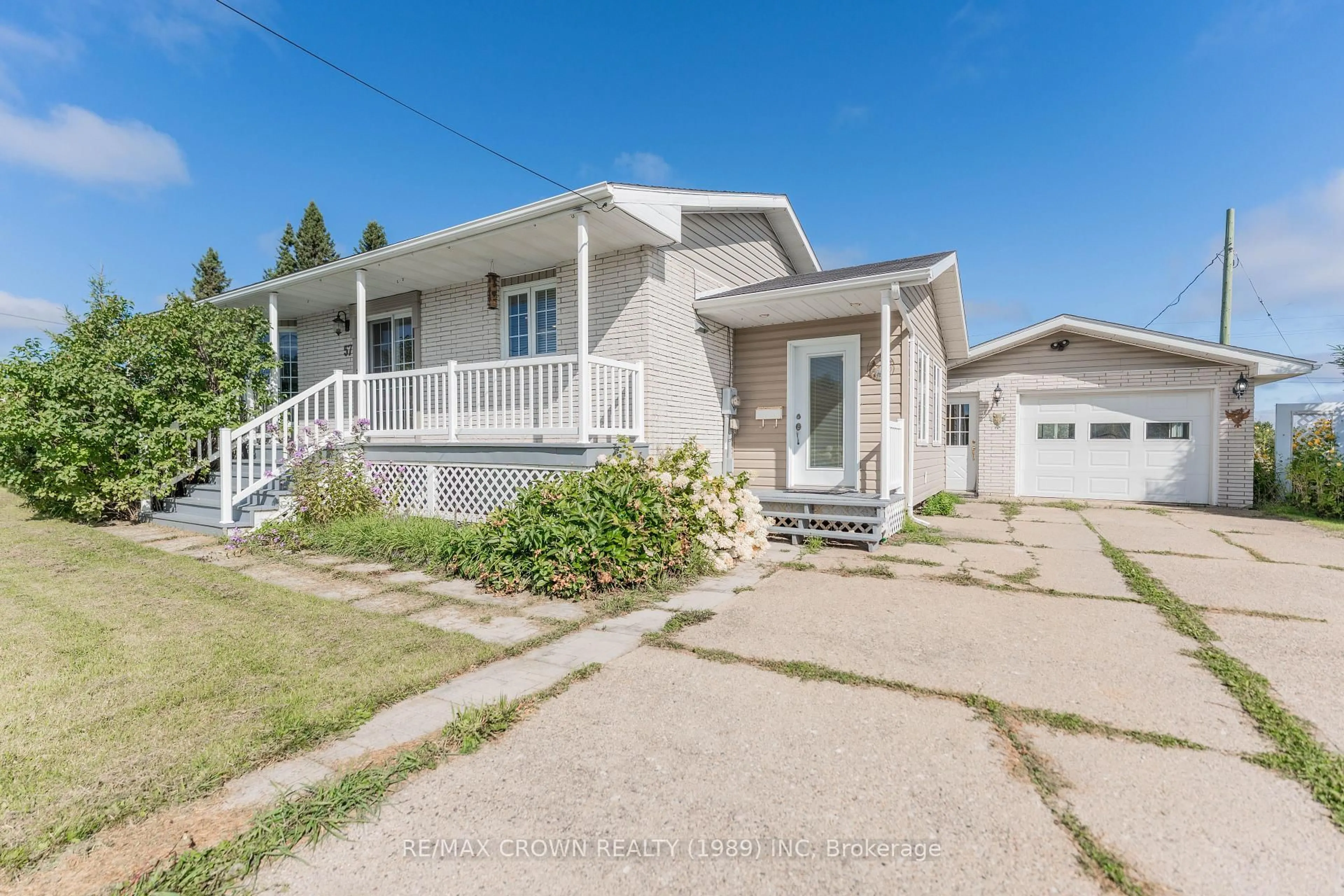 Home with vinyl exterior material, street for 57 Highway 11 #Fauquier, Kapuskasing Ontario P0L 1G0