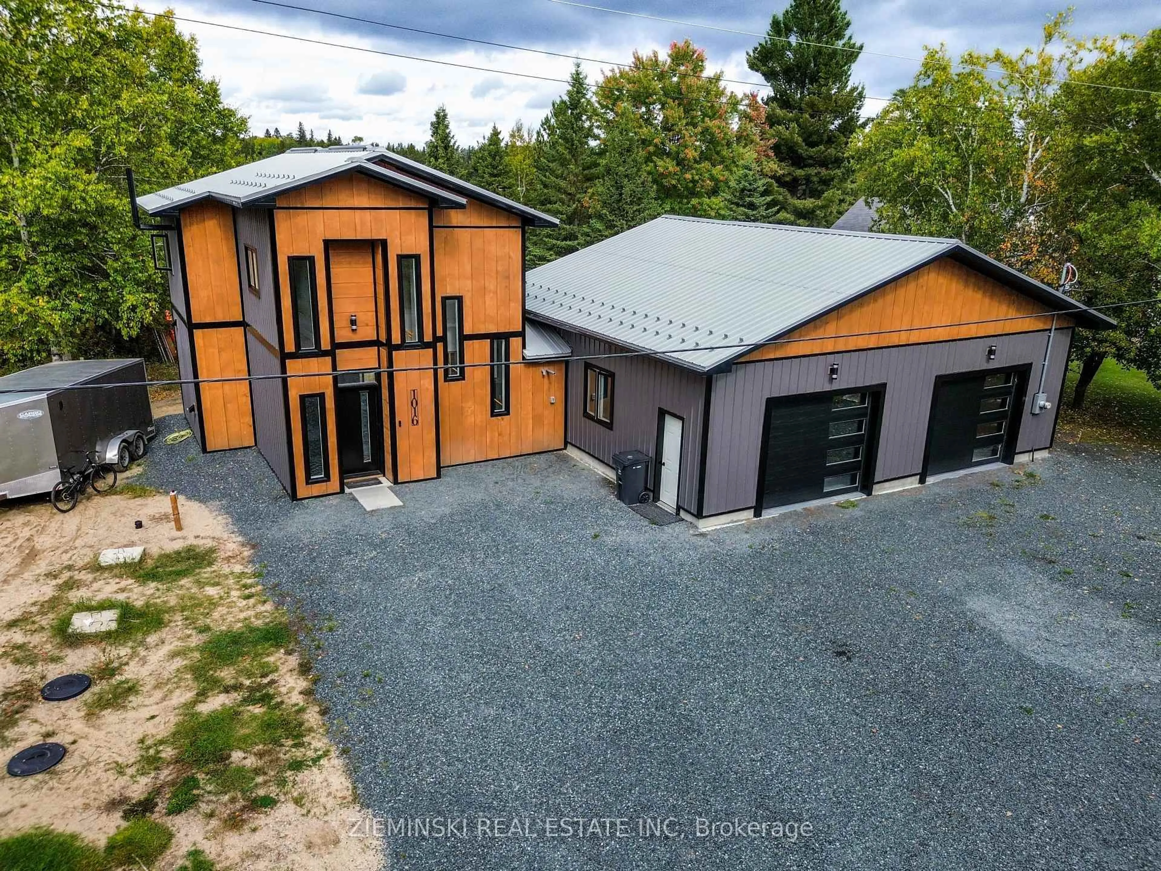 A pic from outside/outdoor area/front of a property/back of a property/a pic from drone, unknown for 1016 Highway Beach Rd, Iroquois Falls Ontario P0K 1G0