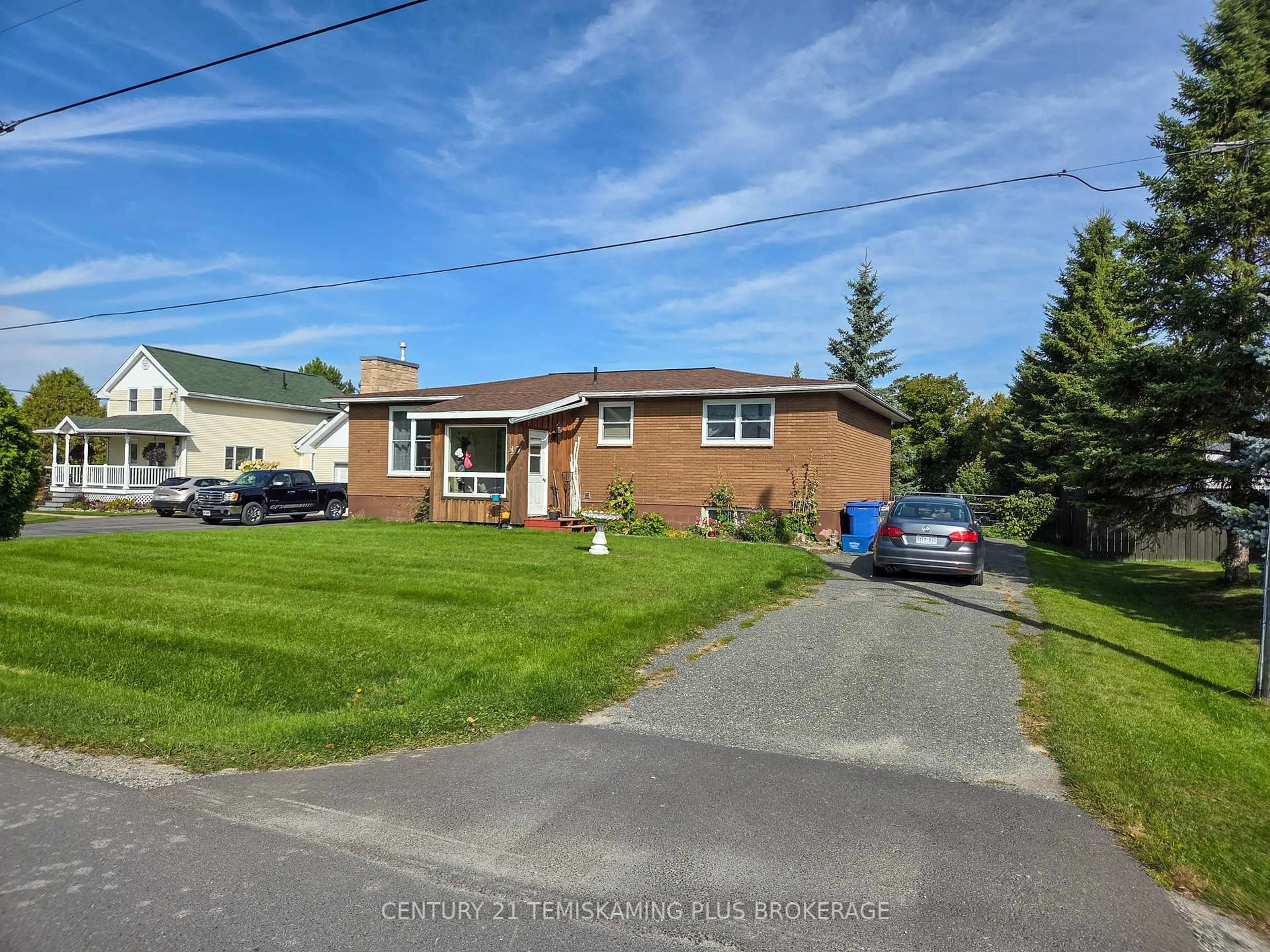 A pic from outside/outdoor area/front of a property/back of a property/a pic from drone, street for 47 Eighth Ave, Englehart Ontario P0J 1H0