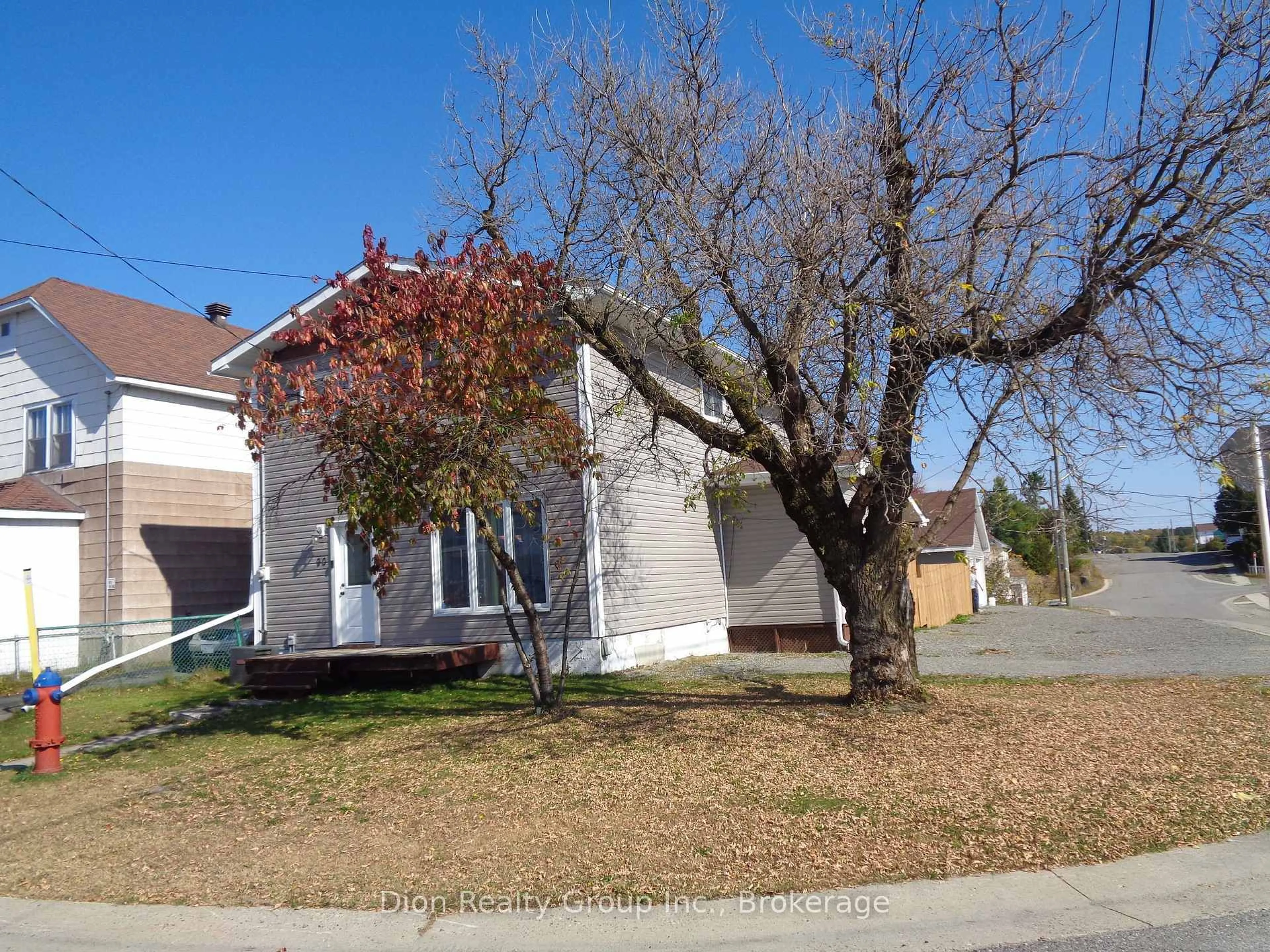 A pic from outside/outdoor area/front of a property/back of a property/a pic from drone, street for 90 Woods St, Kirkland Lake Ontario P2N 3C2