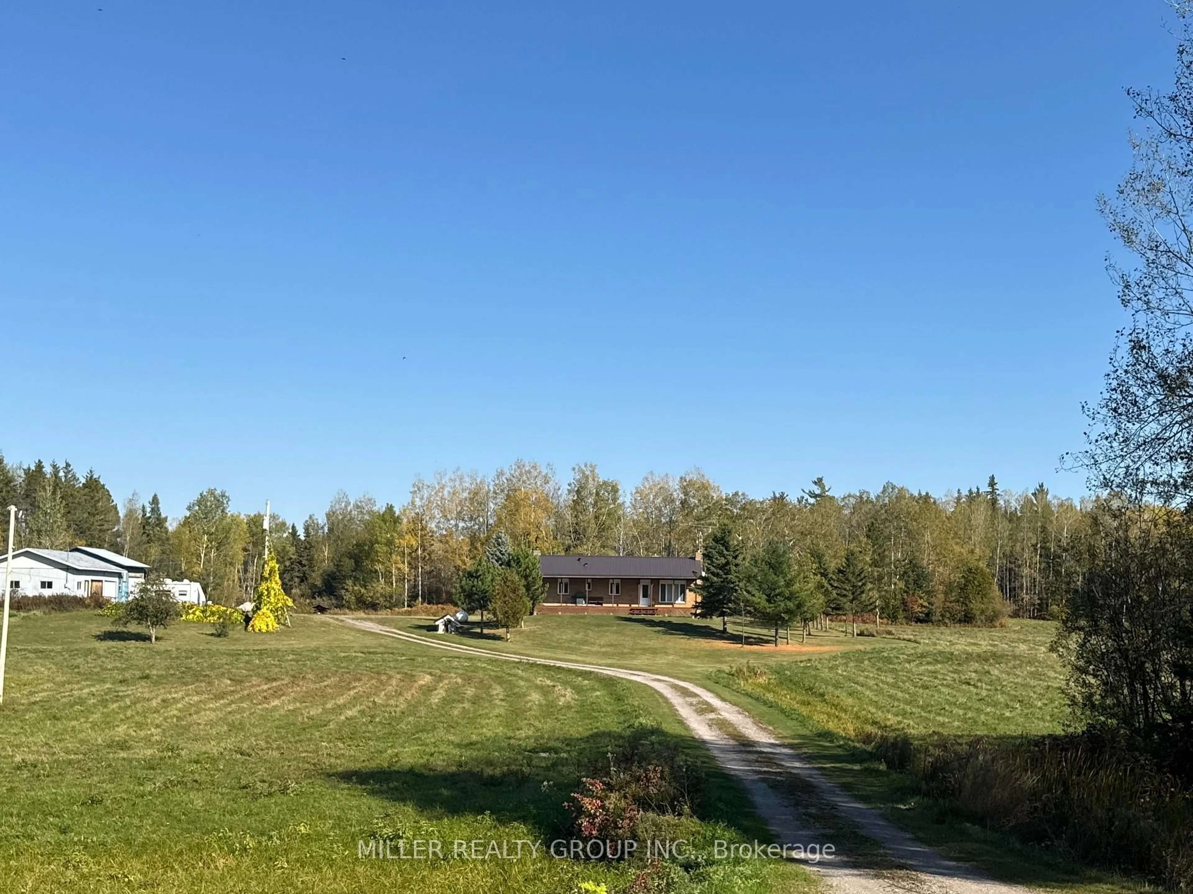A pic from outside/outdoor area/front of a property/back of a property/a pic from drone, mountain view for 278089 Milberta Rd, Timiskaming Ontario P0J 1P0