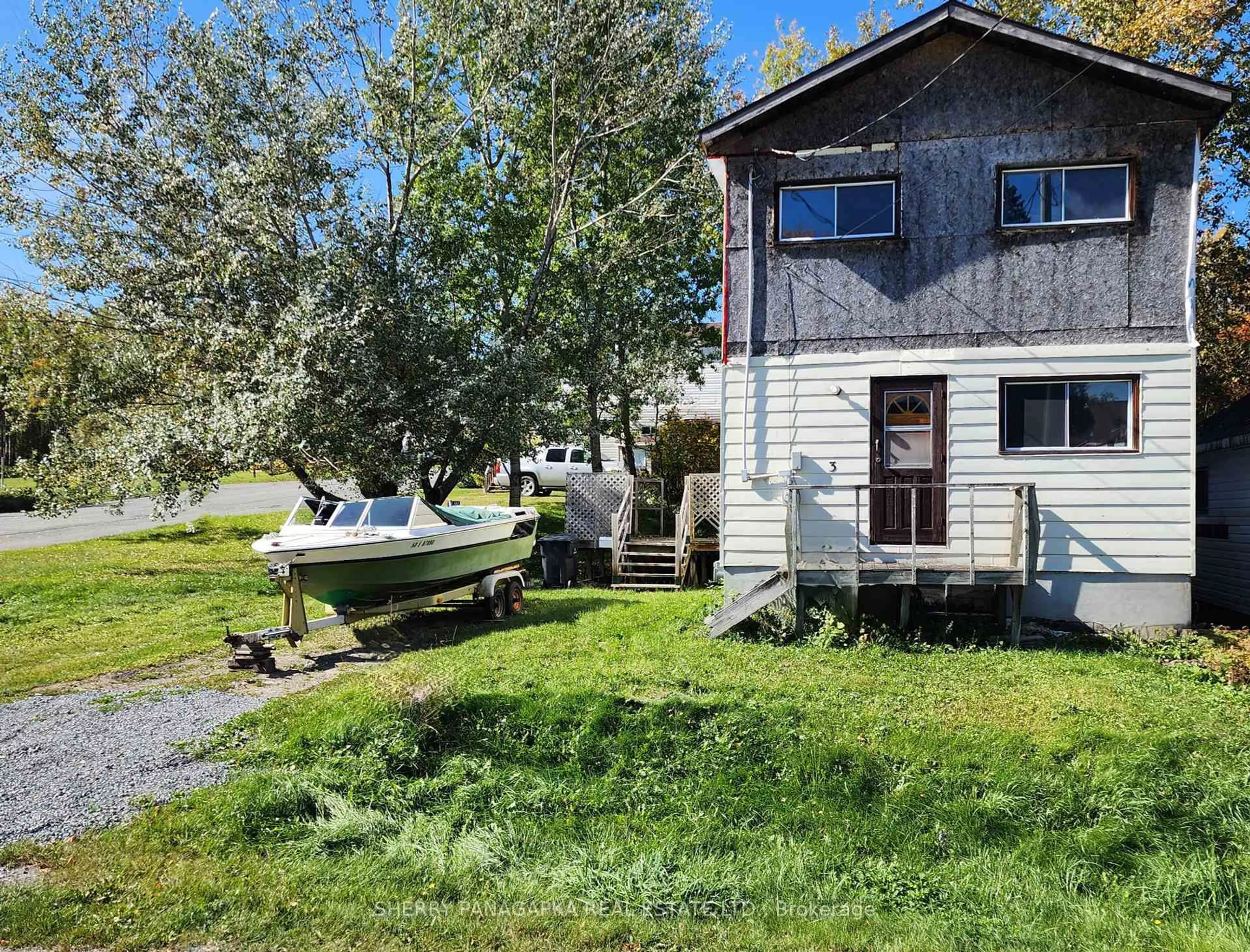 A pic from outside/outdoor area/front of a property/back of a property/a pic from drone, water/lake/river/ocean view for 3 Brown Ave, Kirkland Lake Ontario P2N 1L1