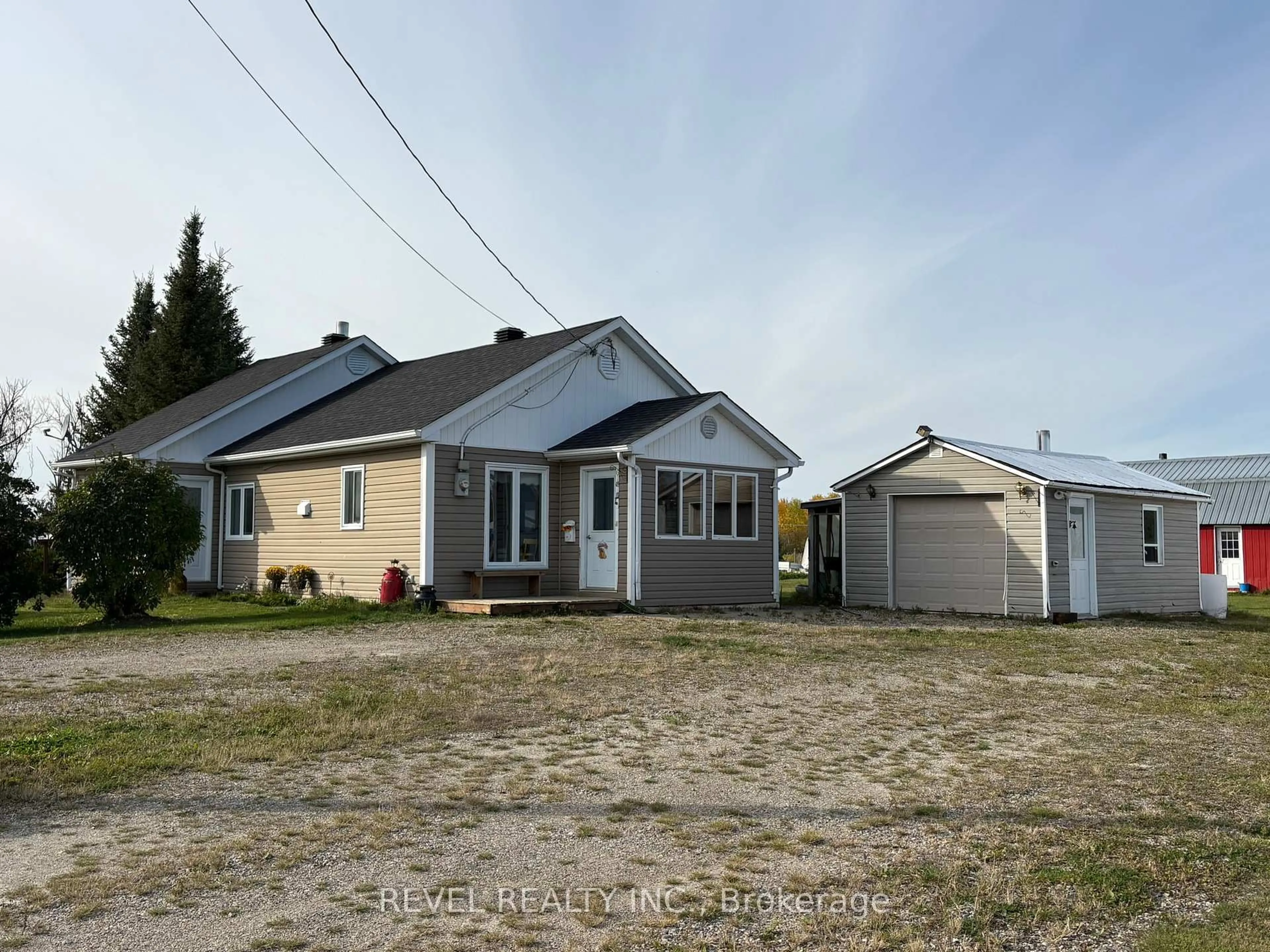 A pic from outside/outdoor area/front of a property/back of a property/a pic from drone, street for 92 Concession 15, Val Rita Concession, Kapuskasing Ontario P0L 2G0