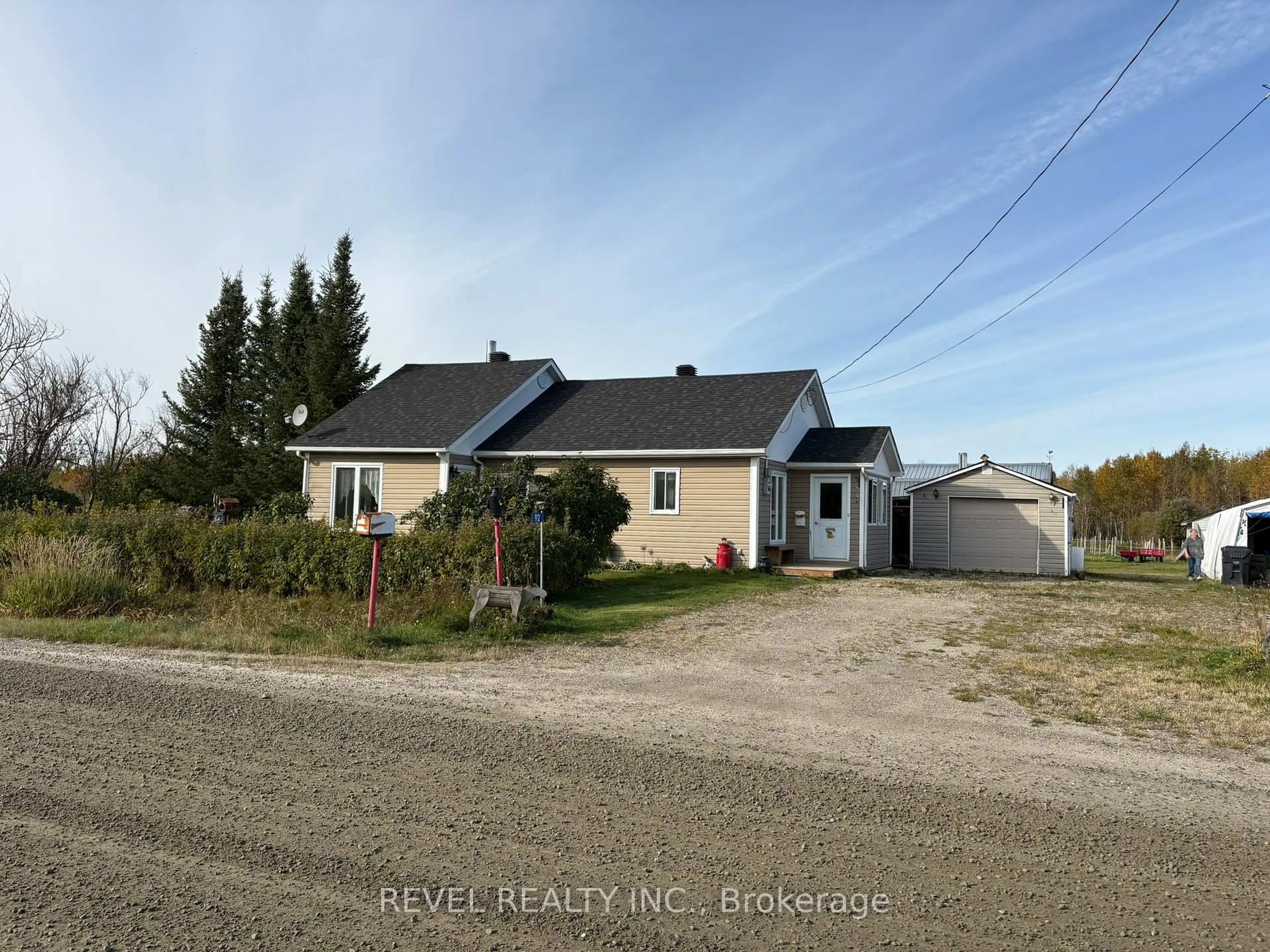 A pic from outside/outdoor area/front of a property/back of a property/a pic from drone, street for 92 Concession 15, Val Rita Concession, Kapuskasing Ontario P0L 2G0