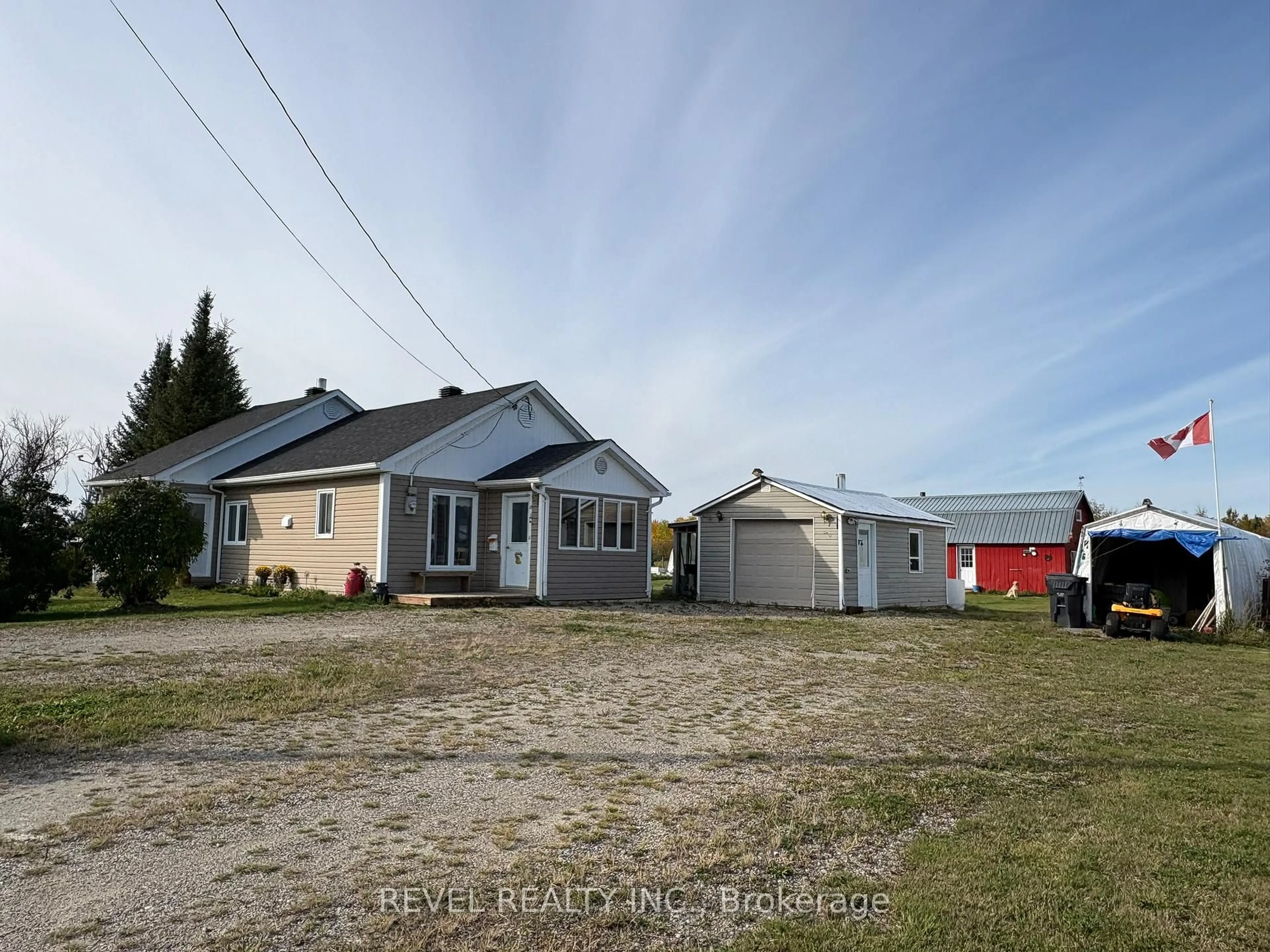 A pic from outside/outdoor area/front of a property/back of a property/a pic from drone, street for 92 Concession 15, Val Rita Concession, Kapuskasing Ontario P0L 2G0