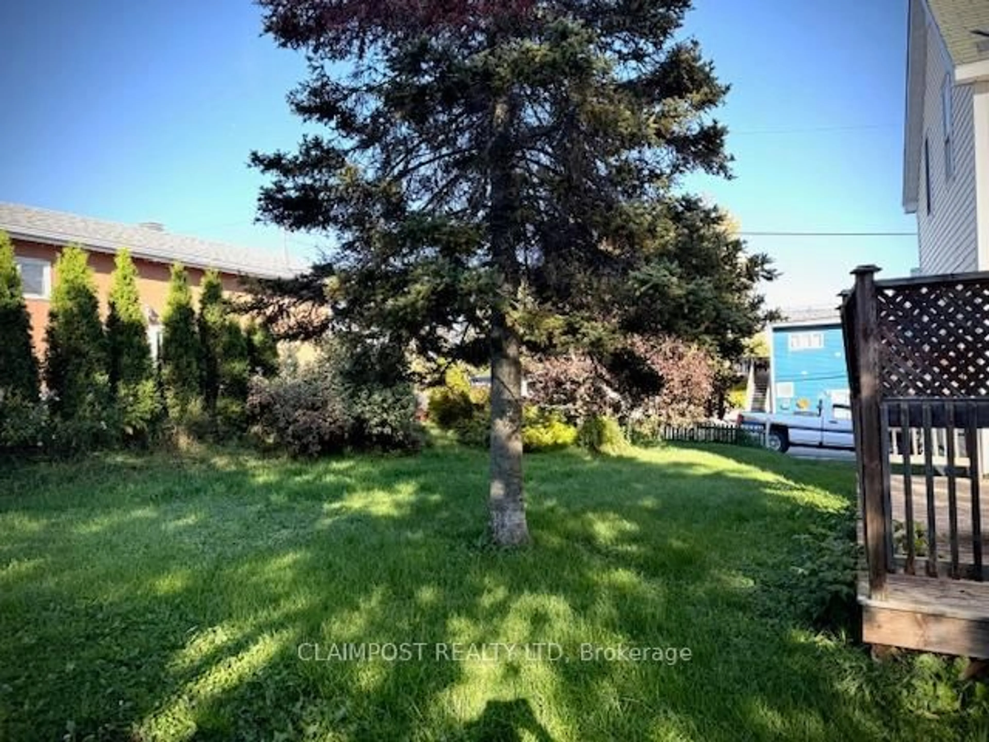 A pic from outside/outdoor area/front of a property/back of a property/a pic from drone, water/lake/river/ocean view for 77-79 Charles St, Timmins Ontario P4N 5C5