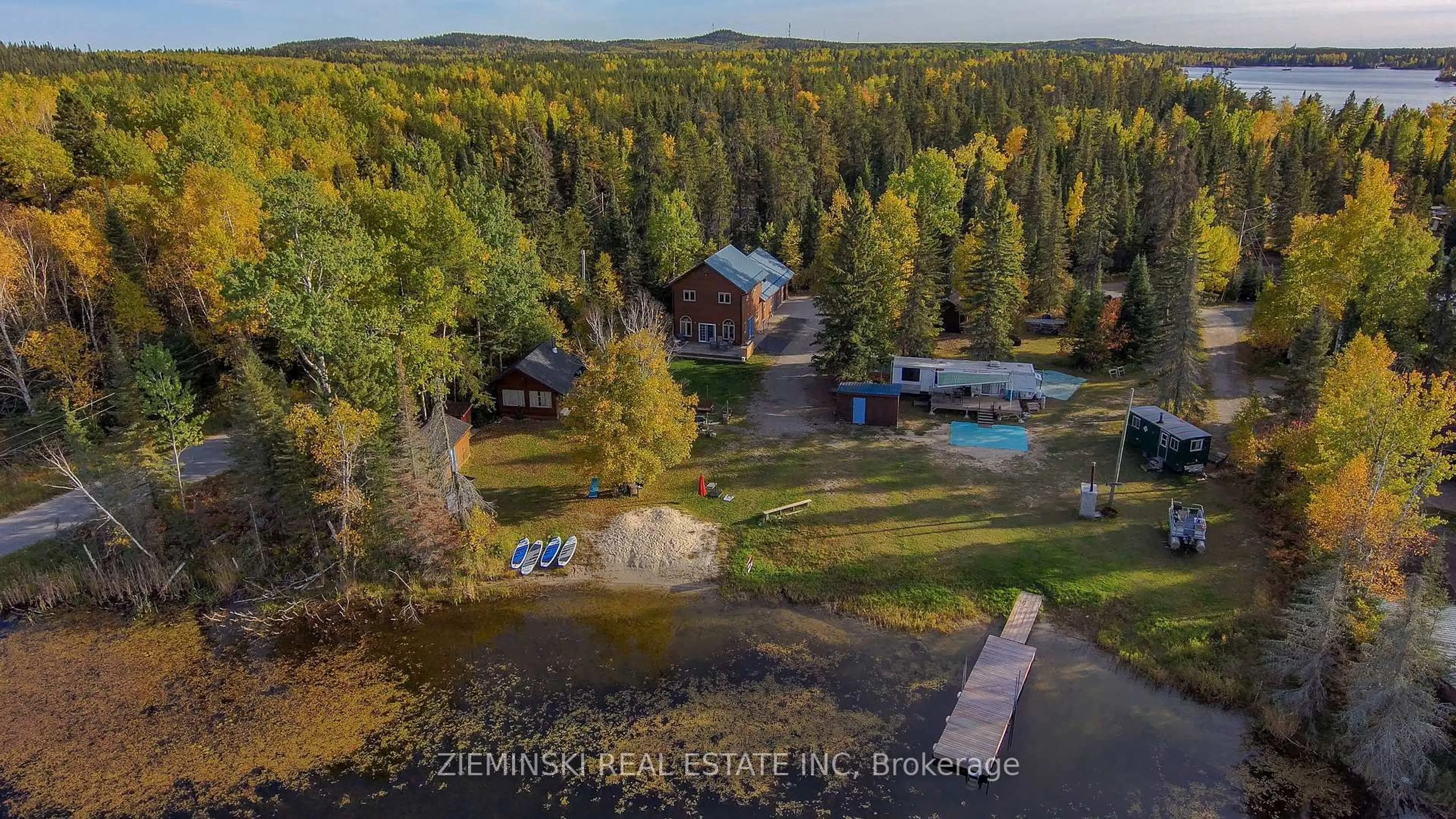 A pic from outside/outdoor area/front of a property/back of a property/a pic from drone, water/lake/river/ocean view for 167 & 169 Nellie Lake Rd, Cochrane Ontario P0K 1G0