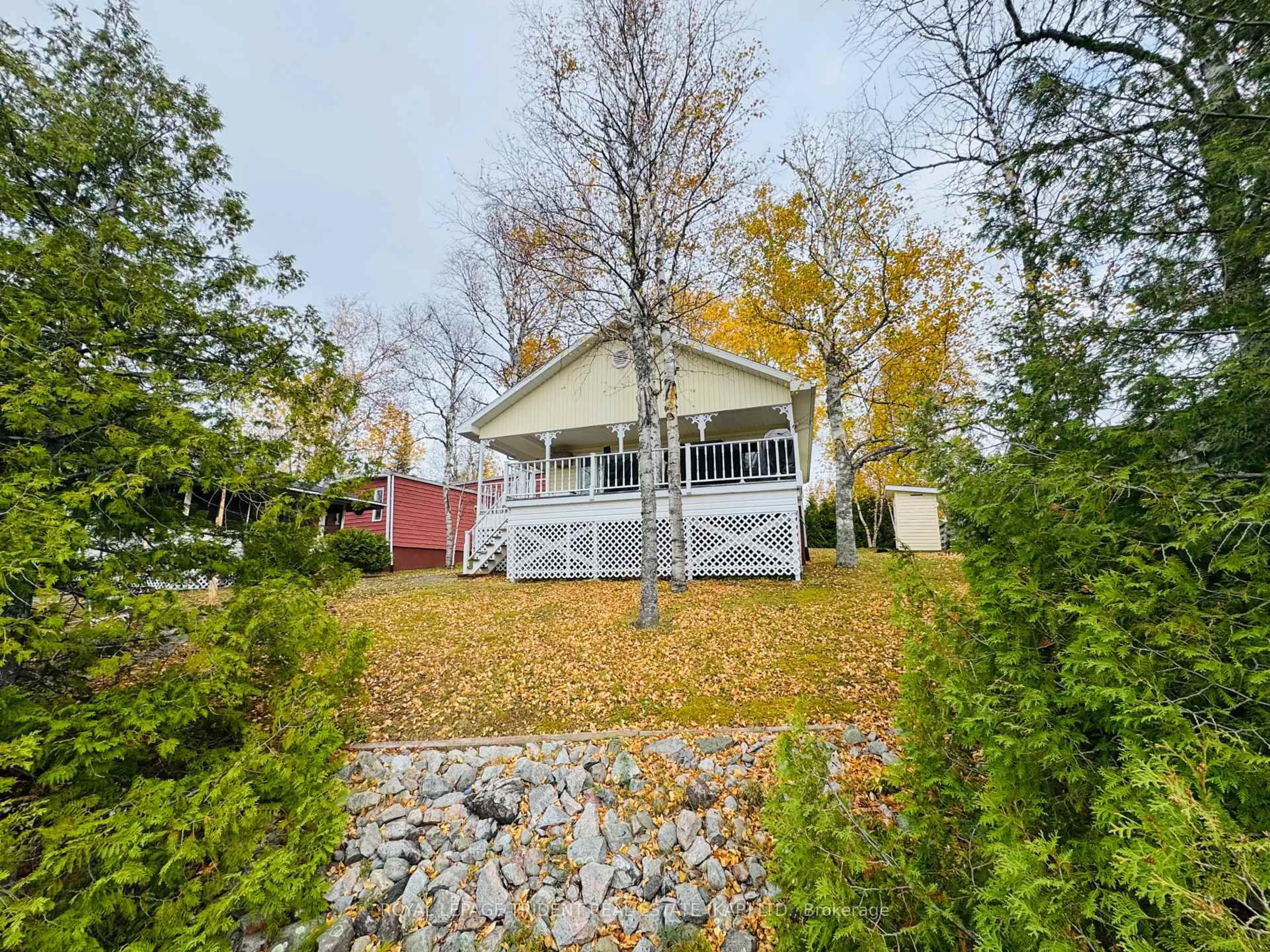 A pic from outside/outdoor area/front of a property/back of a property/a pic from drone, street for 53 Lefebvre Peninsula Rd, Kapuskasing Ontario P0L 1V0