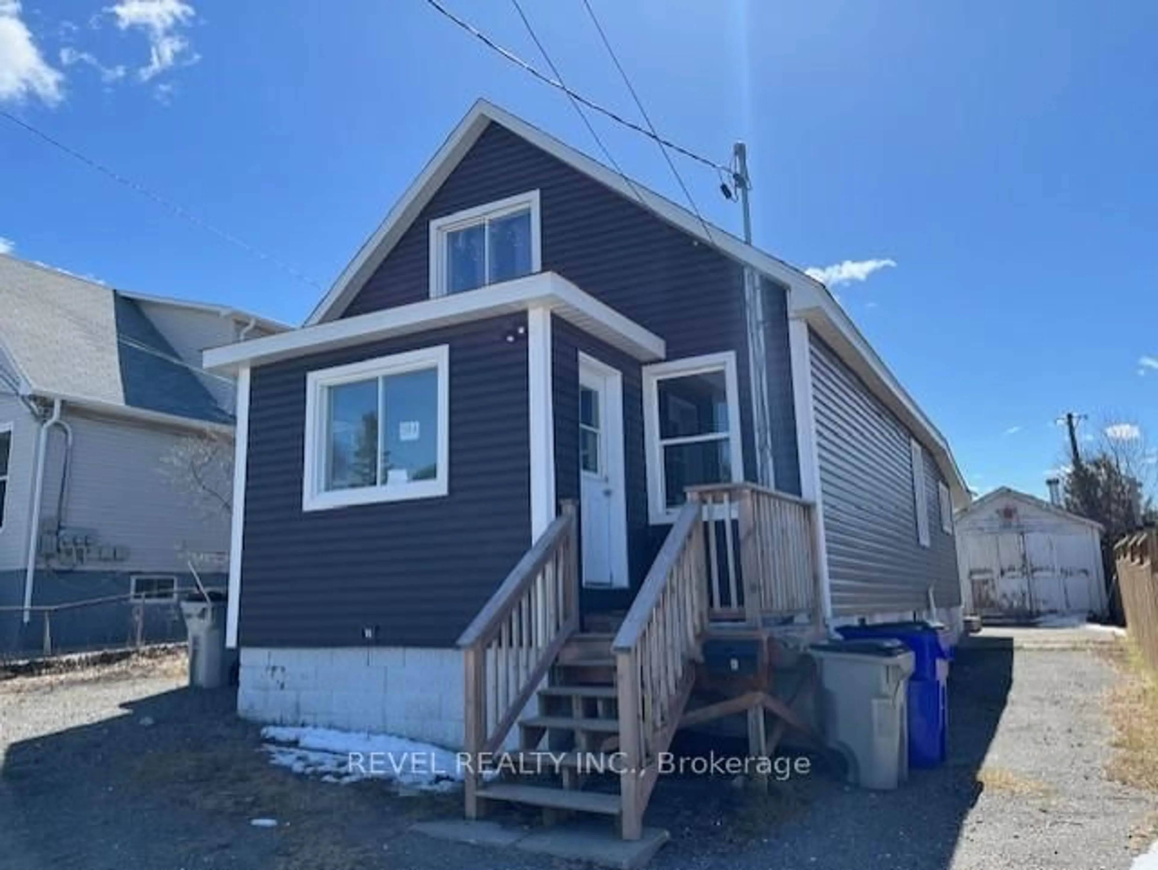 Home with vinyl exterior material, street for 51-53 Kent Ave, Timmins Ontario P4N 3B7
