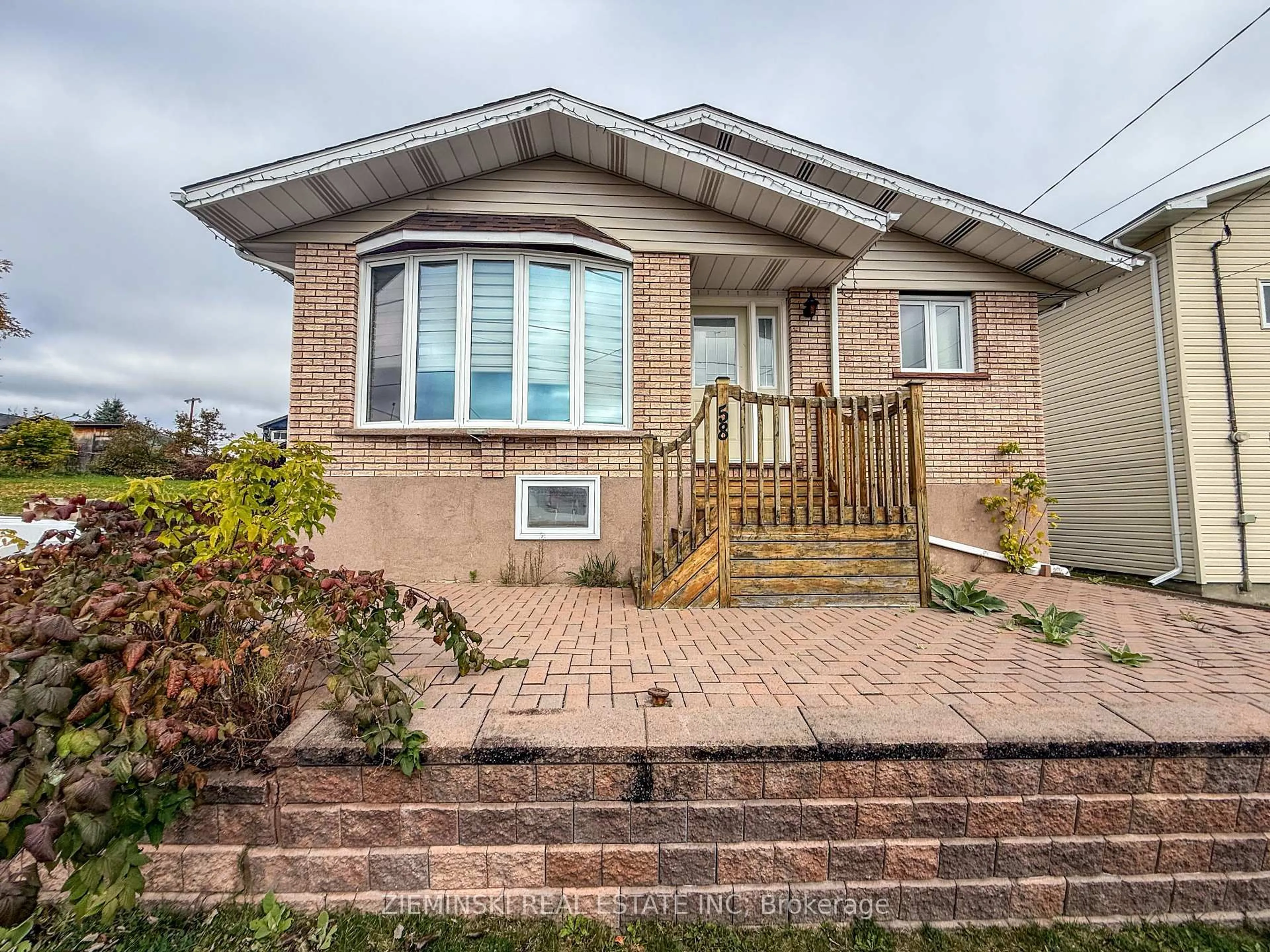 Home with brick exterior material, street for 58 Marion St, Iroquois Falls Ontario P0K 1G0