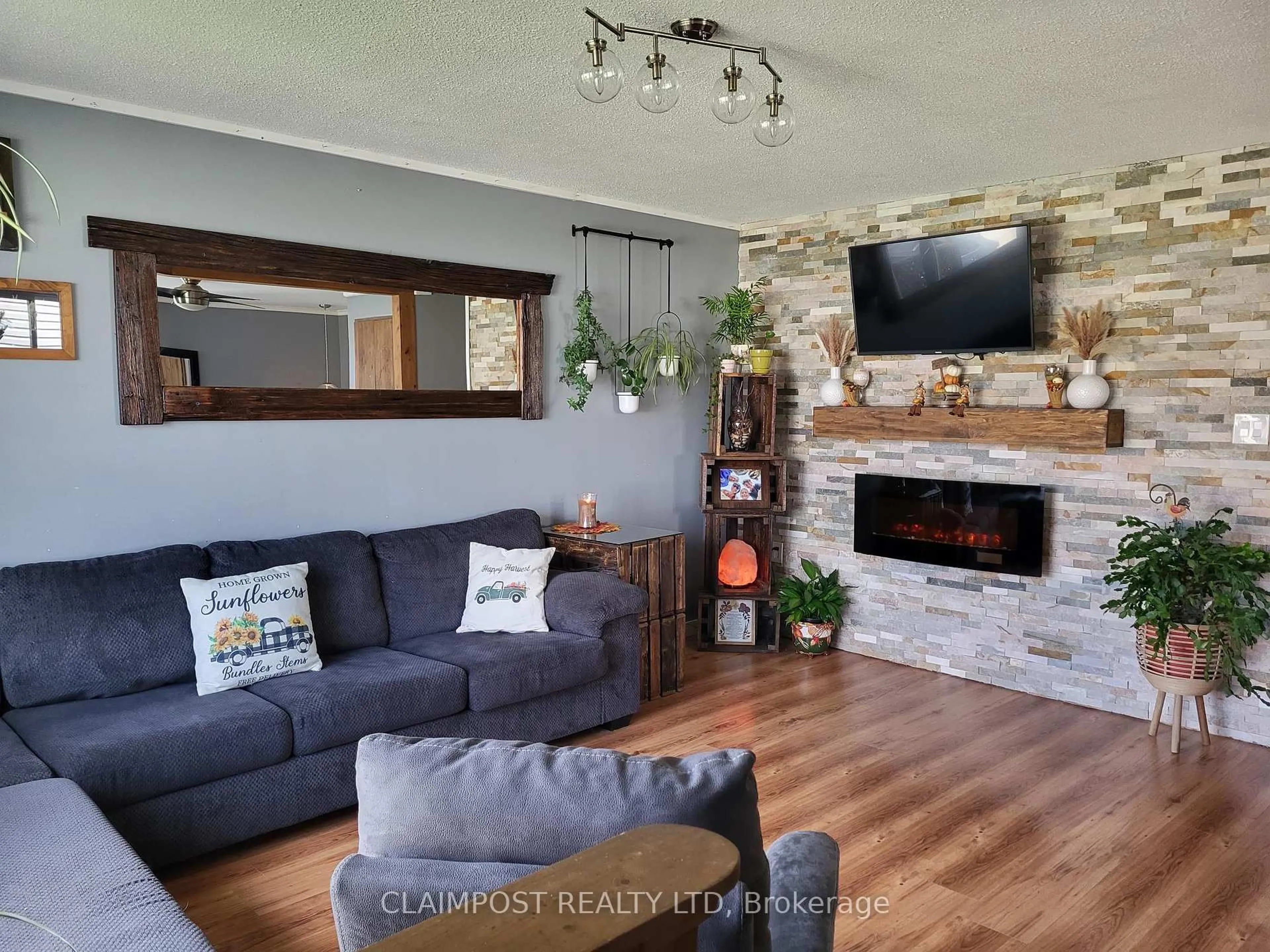 Living room with furniture, unknown for 113 Delia Ave, Timmins Ontario P4P 1A2